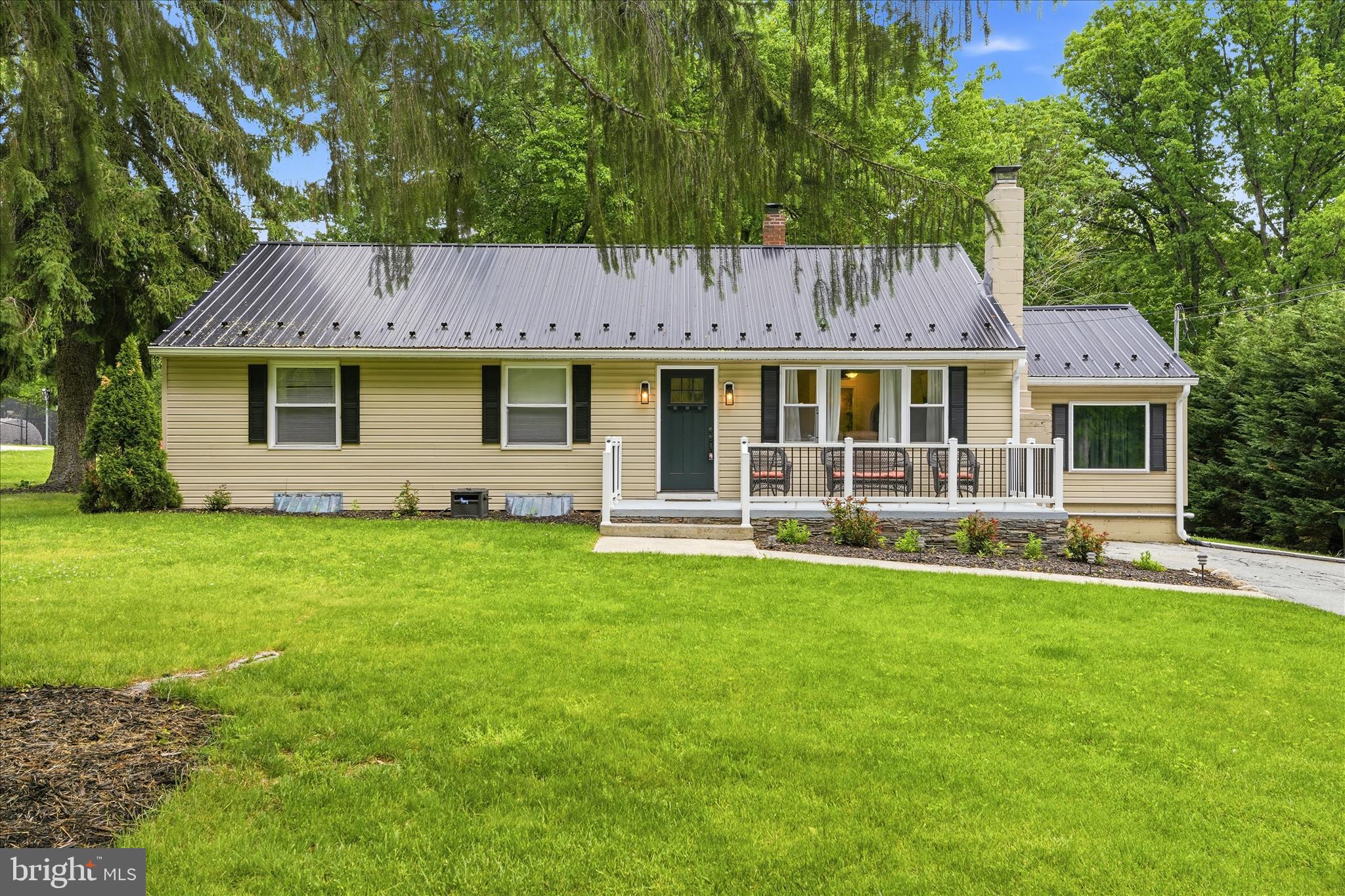OFFER DEADLINE 5/26 AT 5PM! Welcome to this exceptional 4-bedroom, 2-bath ranch-style residence set on a beautifully maintained 1/2-acre homesite in the heart of the sought-after Fort Ritchie area. Surrounded by the natural beauty of the Appalachian Trail and nearby Pen Mar Park, this home offers a rare combination of sophistication, comfort, and scenic tranquility.

Thoughtfully designed for effortless living and elevated entertaining, the home features an expansive chef-inspired kitchen with abundant cabinetry, extensive counter space, and an inviting layout that seamlessly connects to the main living areas. The oversized owner’s suite offers a luxurious private retreat with generous proportions and a relaxing atmosphere, while the additional bedrooms provide spacious accommodations for guests, a home office, fitness space, or additional lifestyle needs.

Step outside to an impressive outdoor entertaining space designed for memorable gatherings, quiet evenings under the stars, and year-round enjoyment of the surrounding landscape. A premium metal roof adds architectural character and enduring quality to this remarkable property.