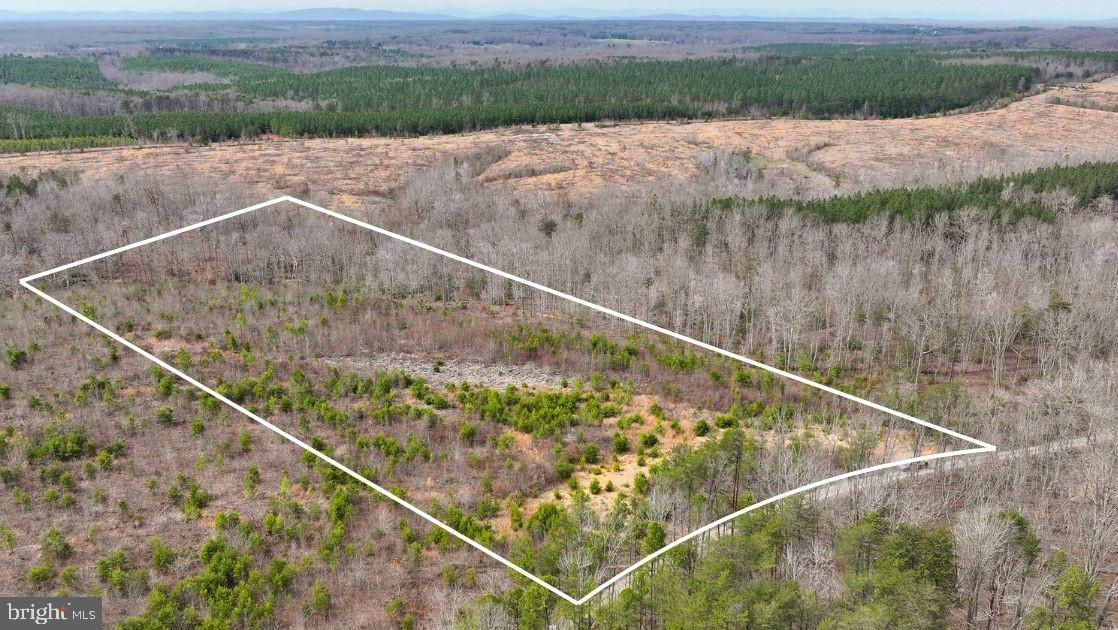 Discover the perfect blend of privacy and convenience on this 13.15-acre wooded property in Louisa County. The property has perked and is suitable for a 4-bedroom conventional septic system! Featuring a beautiful mix of trees and a peaceful setting on a dead-end street, this land offers a true escape into nature. Accessed via Wesbey Drive with connection to Mt Airy Rd, the property provides easy access while maintaining a sense of seclusion. Enjoy close proximity to US-33 and US-522, as well as the Town of Louisa and Mineral, making commuting and daily needs convenient. With no HOA restrictions and desirable A2 zoning, this property offers flexibility for a variety of uses whether you’re planning a dream home, recreational retreat, or small farm. Experience the tranquility of country living without sacrificing accessibility—this is your opportunity to create a private haven tailored to your vision.
