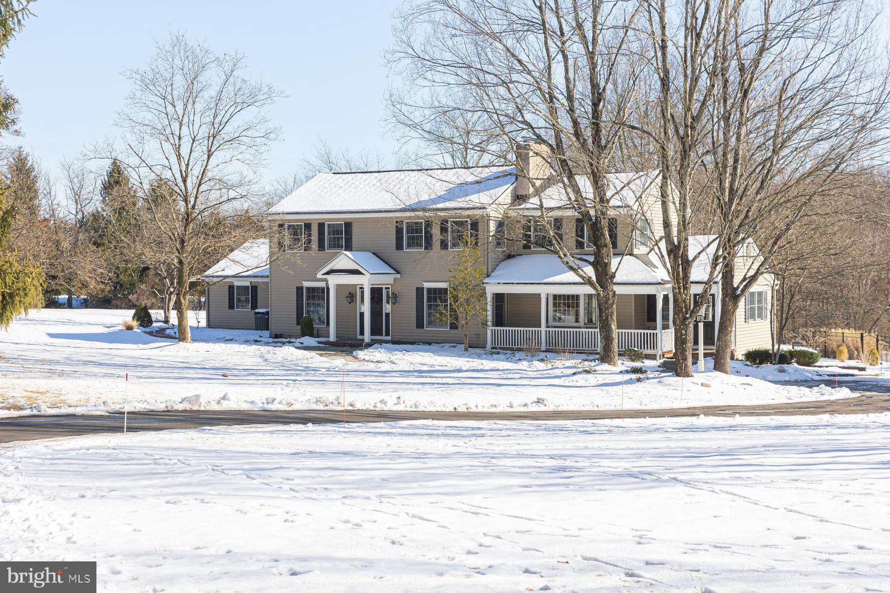 ***Please submit all offers no later than Noon on Tuesday, February 4th.  Nestled on just over 4 serene acres with sprawling views in sought after Upper Makefield, this stunning home offers the perfect blend of space, comfort and natural beauty. This beautiful home boasts 4 bedrooms and two and 1/2 baths, with a layout designed for relaxation and entertainment.  Beautiful Hardwood floors for seamless flow and new Anderson oversized windows which provide abundant light throughout add to this delightful home. A generous formal dining room and an informal living room with wood burning fireplace are special places to build memories. The nearby eat in kitchen features granite counters with counter seating and expansive dining area, dry bar, wine cooler convenience at your fingertips for all your entertaining needs.  Stunning views with convenient patio access to beautifully curated blue stone patios and outdoor seating, are the perfect setting for alfresco dining! garden walkways from patio to pool makes outdoor entertaining effortless. Back inside the main corridor features unique and beautiful Ash random plank floors which lead to the dramatic and spacious sunroom with vaulted ceiling and abundant natural light, this room was made to enjoy breathtaking surround views of this peaceful property.  Adjacent to the sunroom is a cozy gathering room with wood burning fireplace and built in bookcases adding warmth and versatility to the home. Double doors lead to a spacious mudroom, study, home office with separate entrance from a covered porch.  An unfinished basement which offers workspace, gym and plenty of storage offers many possibilities! Outside, enjoy the recently refurbished pool area with custom landscaping and patio design that creates a luxurious oasis for summer relaxation, irrigation system, and outdoor lighting add beauty day and night! As a bonus, a separate one bedroom, in-law equipped space is perfect for extended family or guests.  With its picturesque views, open and bright interiors, and prime location in Upper Makefield near Newtown, the I 95 corridor, surrounded by preserved land.  This property is a true gem for those seeking privacy without compromising convenience.