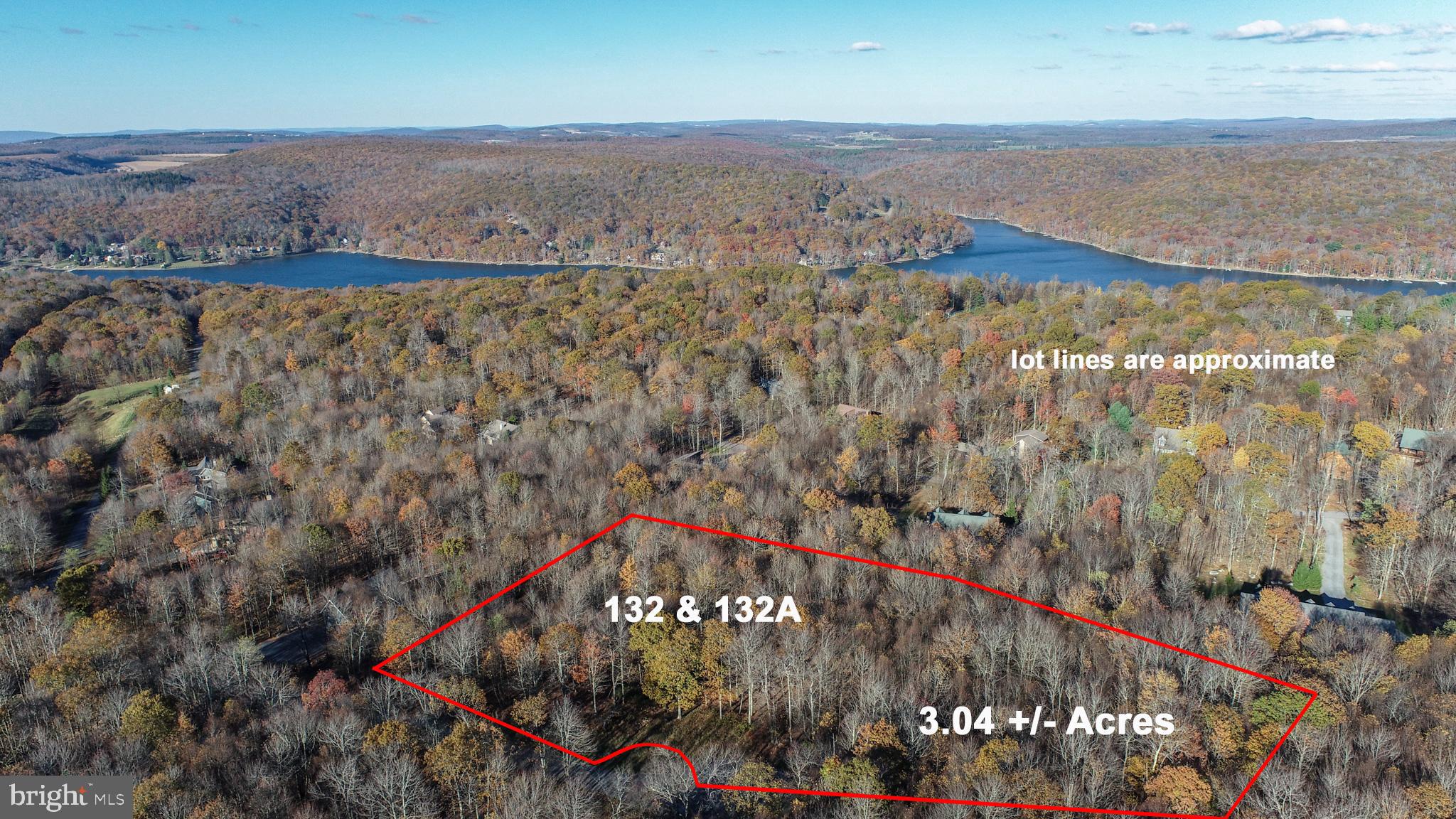 Lake Access Lots 132 & 132A in the Mountainside Community offer 3.04 acres of privacy at the end of a quiet cul-de-sac on Tarn Drive. Combined and recorded in the land records as one building site, this property is already serviced by public water and sewer—making it ready for your future build. The gently wooded setting provides a peaceful, natural backdrop with plenty of space to design your ideal mountain retreat. Enjoy lake access along with the convenience of easy year-round access, all while being just minutes from Deep Creek Lake amenities, dining, and recreation. Plat and utility information available.