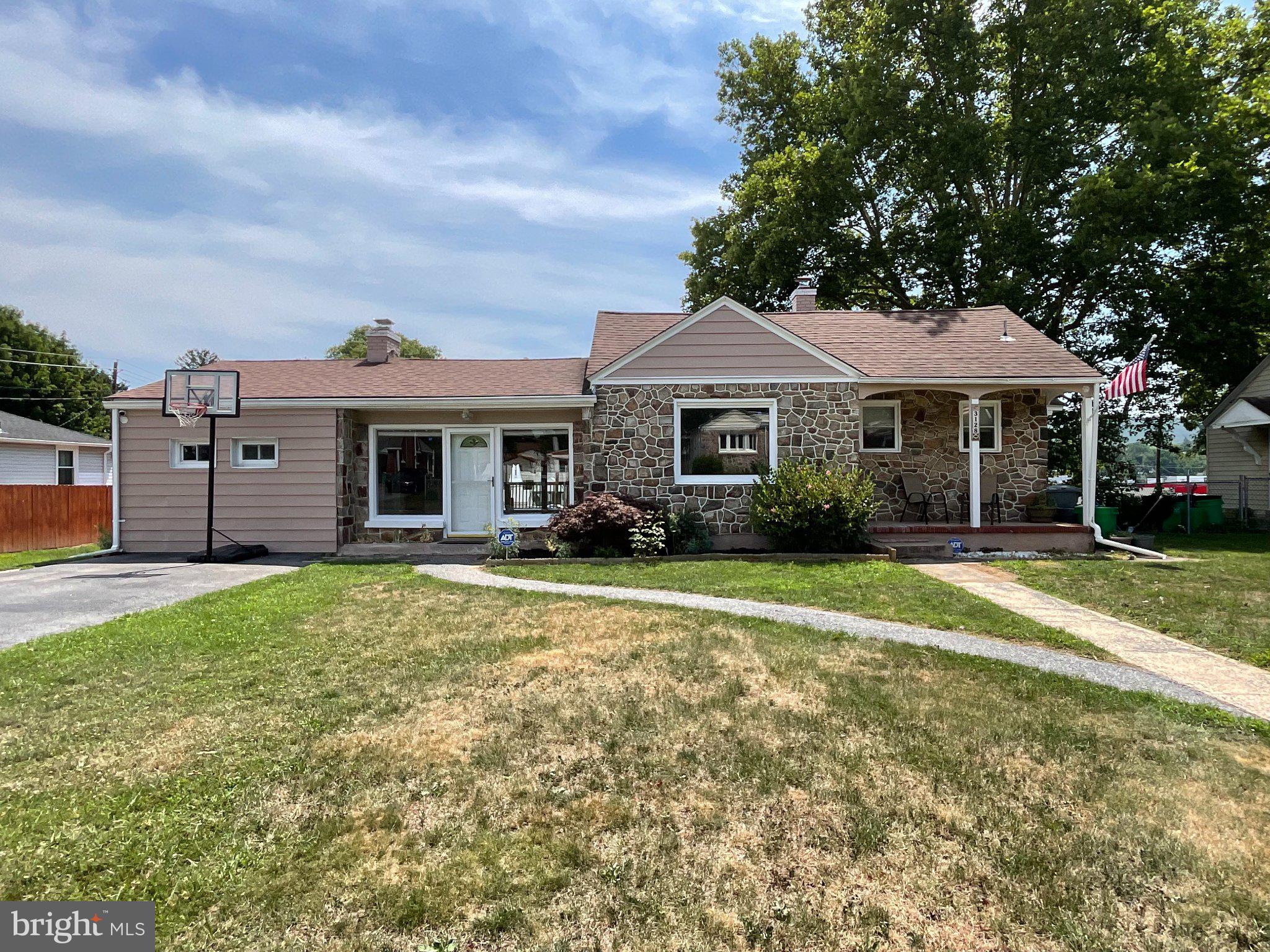 **Spacious One-Floor Living with Character, Updates & Over 1,800 Square Feet!** Welcome to 3128 Diamond Avenue—a spacious and distinctive 3-bedroom, 1.5-bath ranch offering more than 1,800 square feet of comfortable one-floor living. One of the largest homes on the street and ideally situated at the end of a cul-de-sac, this well-maintained home combines the character and craftsmanship of an older home with many important modern updates. A handsome stone facade and covered front porch create an inviting first impression. Inside, you’ll find an open and easy-flowing floor plan connecting the kitchen, dining, and living areas—perfect for both everyday living and entertaining. Large windows fill the home with natural light, while beautiful original hardwood floors, coffered ceilings, and a wood-burning fireplace add warmth and architectural character rarely found in newer construction. The updated kitchen features granite countertops, a stylish backsplash, stainless steel appliances, and plenty of workspace, all opening naturally to the main living and dining areas. Fresh interior paint provides a clean, move-in-ready feel, while an updated roof and HVAC system offer added peace of mind. All three bedrooms, both bathrooms, and the main living spaces are conveniently located on one level—making this an excellent choice for buyers seeking comfortable, accessible one-floor living without sacrificing space. Outside, enjoy both covered front and rear decks, providing inviting spaces to relax, entertain, or enjoy the outdoors in any season. Conveniently located near shopping, dining, and major highways, this home stands apart with its generous size, desirable location, recent updates, and a spacious one-level layout that is increasingly difficult to find. **If you’ve been searching for a ranch home with lots of space, character, and the right combination of classic craftsmanship and modern updates, you won’t want to miss this turn-key home.**