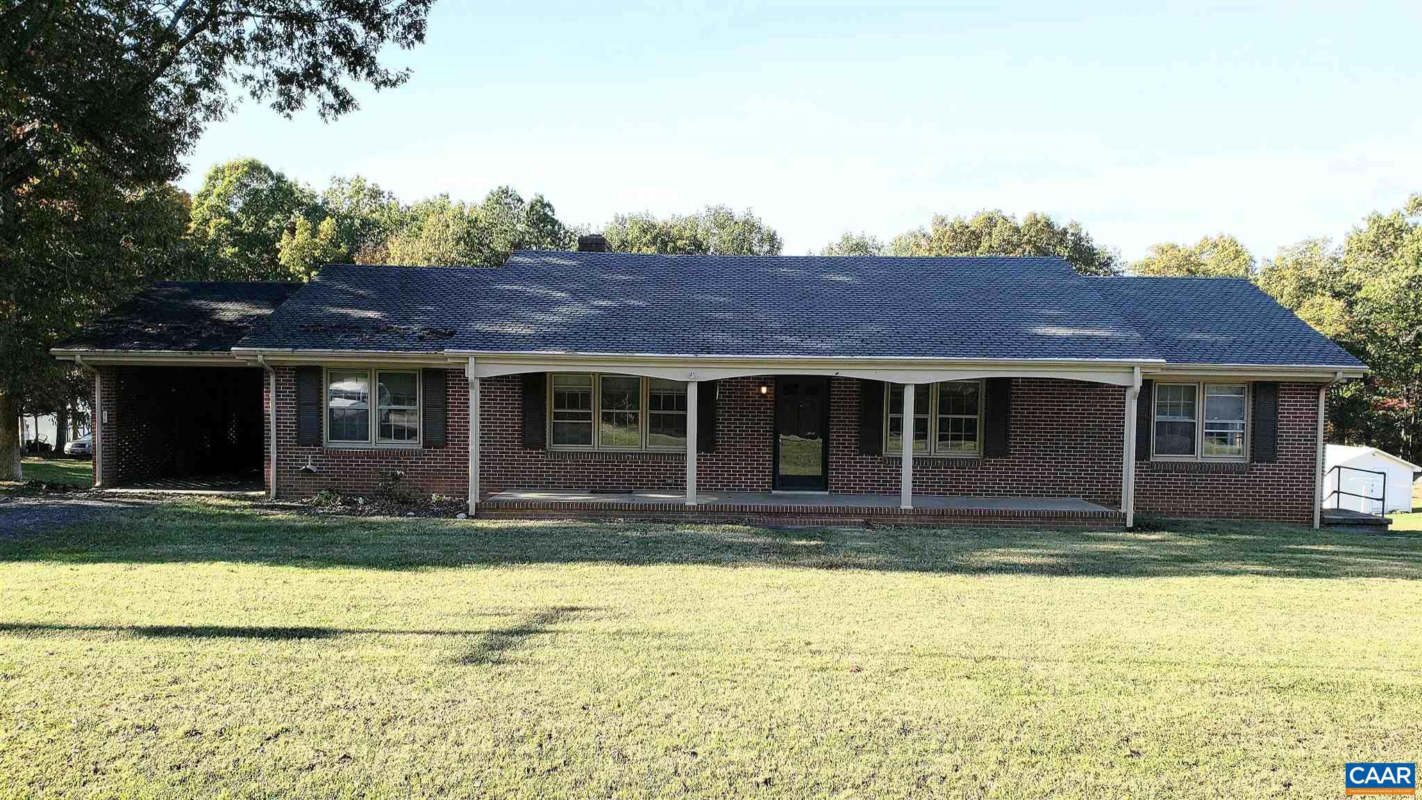 All brick ranch in New Canton. well cared for ranch home in good condition. 4 bedrooms with 3 full baths- 2 baths up with 1 full in basement. 1 of 4  bedroom/office/study/ in basement. Great room in the basement use rec room/large function room/game room/get creative.  Full laundry room in basement. PLUS large eat-in country kitchen. original hardwood floors. Windows let in lots of natural light. green views. carport off kitchen. covered front porch. Dining room! LARGE formal living room. Family Room with bricked wood burning fireplace with stove insert. All offers are being presented to the sellers! Starting bid does not represent the final sale price. Trustees have the right to accept or refuse any and all offers.,Wood Cabinets,Fireplace in Family Room