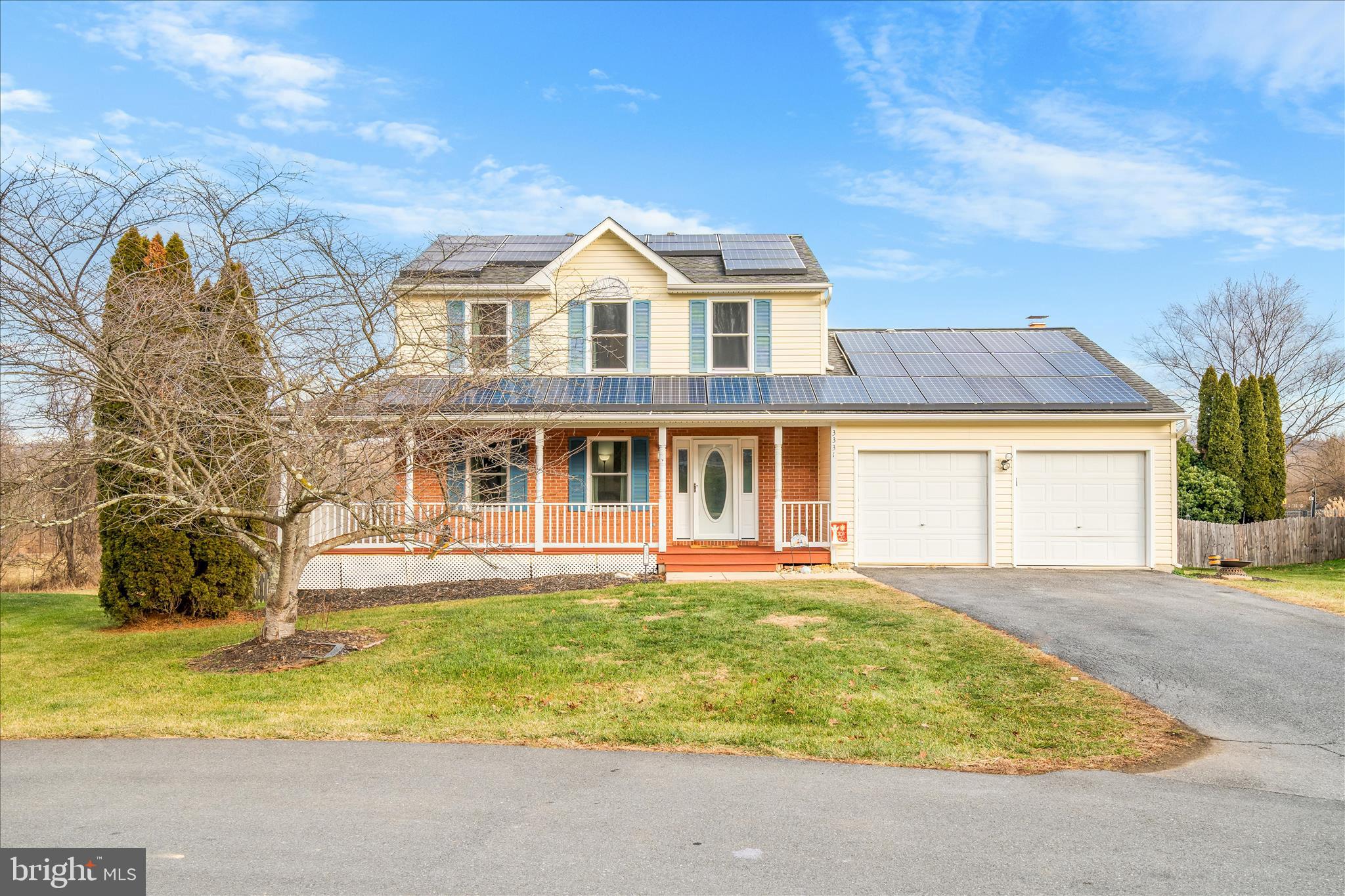Gorgeous single-family home situated on just under half an acre at the end of a quiet cul-de-sac, backing to Buckeystown Park for lasting privacy and peaceful views. Enjoy the outdoors from the inviting wraparound porch or relax in the backyard oasis featuring an in-ground pool (liner replaced in 2024), newer pool cover (Loc Loop, 2021), and newer pool decking (2023) for lounging, all overlooking serene parkland beyond the fenced yard. The pool area is additionally fenced for safety.

A paved driveway accommodates up to four vehicles and is complemented by a two-car garage. Solar panels provide energy savings (roof and siding replaced  2014). 

Step inside to a welcoming entryway with a convenient coat closet and luxury vinyl plank flooring throughout the main level in a modern palette. A spacious living room sits to the left and flows easily toward the kitchen, while a hallway straight ahead leads past a half bath located off the kitchen area.

The renovated kitchen (2022) features crisp white cabinetry extending to the ceiling for added storage, leathered granite countertops, a sleek tile backsplash, stainless steel appliances, and an stainless steel exhaust range hood. A large center island offers additional prep and storage space. The kitchen has been thoughtfully opened to the dining area, creating a seamless flow ideal for everyday living and entertaining. The open layout continues into the family room, highlighted by a brick fireplace with mantel, perfect for décor and photos.

Newer windows (2022) and exterior doors (2022) enhance natural light and energy efficiency throughout. A deck off the kitchen allows for al fresco dining and steps down to the pool area, making entertaining effortless.

Upstairs, LVP flooring continues throughout, including all bedrooms. The primary bedroom offers backyard views, a ceiling fan, a walk-in closet, and an en-suite bathroom with a soaking tub, shower stall, and linen closet. Two additional spacious bedrooms, both with ceiling fans, along with a hallway linen closet, complete the upper level.

The mostly finished basement includes a recreation room, a half bathroom, and an additional bedroom with a closet. Unfinished space houses the laundry area (washer 2024 and dryer 2025 both convey), well treatment system, water heater, and HVAC system (replaced in 2021). A sliding door leads to a patio, small shed, and under-deck storage area.

Backing directly to Buckeystown Park, residents enjoy easy access to the Monocacy River, including fishing spots, kayak and canoe launches, picnic shelters with tables and grills, horseshoe pits, and a playground, an ideal setting for outdoor recreation and beautiful fall foliage views. All of this is just minutes from downtown Frederick, with easy access to shopping, dining, and major commuter routes, including I-270, and I-70.