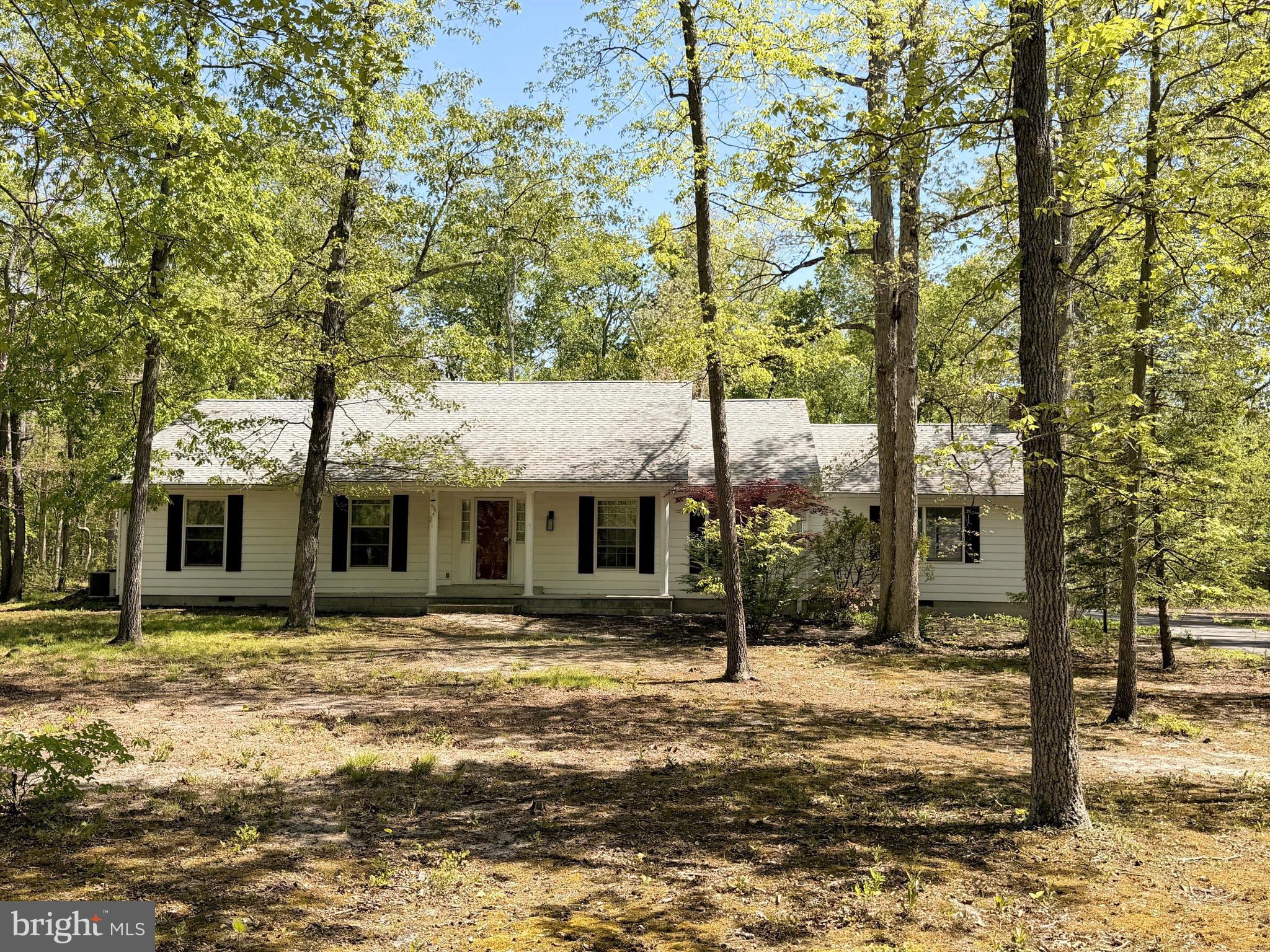 Sold as-is.  Spacious 3 bedroom 2 full bathroom rancher located in sought-after Fox Grape neighborhood. Home is situated on private, wooded 1.23+/- acre lot. Included in the sale is an additional, adjacent .60+/- acre wooded lot for a total of 1.83+/- acres of land. Newer kitchen cabinets.  Nice concrete patio, paved driveway and detached two car garage with additional workshop with power and rough-in. Don't miss the opportunity to make this home your own.