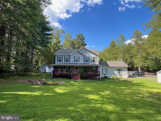 Sellers present a rare opportunity to own on the private side of Lake Anna! Located in the quiet, low-traffic community of Jerdone Island, this property offers exceptional flexibility as a  full-time residence, short-term rental investment, or private family retreat.
Situated on a tree-lined 0.73-acre lot, this well-maintained 3-bedroom, 2.5-bath home blends comfort, functionality, and privacy. The updated kitchen features freshly painted cabinetry, new hardware, and a new sink, while refreshed bathrooms provide a clean, modern feel throughout. The primary suite stands out with a double vanity, custom cabinetry, and striking tile work that extends seamlessly from the floor through the walk-in shower and up the walls.
Designed for indoor–outdoor living, the home offers a  large gated front porch and spacious rear deck with an outdoor shower hookup, ideal for entertaining or relaxing after a day on the lake. The fully fenced backyard and mature tree line create a private setting with plenty of room for pets, play, or outdoor gatherings. Two storage sheds add excellent functionality, including one with electricity—perfect for a workshop, hobby space, or additional lake gear storage.
The home is equipped with two HVAC systems, with the upstairs unit newly installed in 2025. Brand new 2026 water heater and washing machine. The living room includes gas fireplace hookup, allowing for easy future installation if desired. The oversized garage provides ample room for a vehicle, water toys, or storage, along with a durable vinyl-floored entry landing into the home.
Residents enjoy private community lake access with a leased boat slip, just a 5-minute golf cart ride away, making lake days easy and convenient. The neighborhood is known for its privacy, peaceful atmosphere, and minimal traffic. Firefly Broadband is available, supporting remote work, full-time living, or short-term rental guests.
Whether you’re seeking a high-performing lake investment, a weekend escape, or a full-time home, this property delivers privacy, versatility, and prime access to everything Lake Anna has to offer.