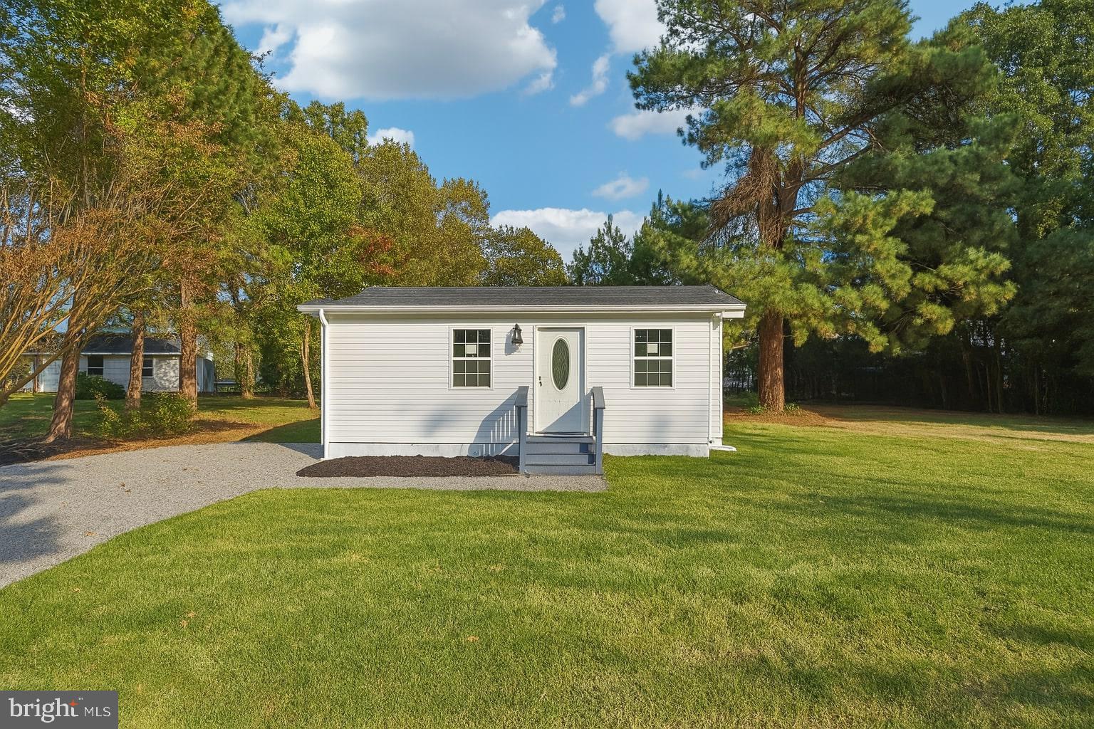 Rebuilt from the foundation up,  this home presents exceptional value just steps from the beach - less than 200 yards from the Potomac River, Practically  brand-new  in an unbeatable waterfront setting.

This gorgeous 3-bedroom, 2-bath coastal retreat has been completely rebuilt from the foundation up, with brand-new everything and even water views. Located in a golf-cart-friendly neighborhood, it’s the perfect mix of small-town charm and modern comfort. Step inside to a bright, open-concept layout with wide-plank LVP flooring throughout. The kitchen features quartz countertops, stainless steel appliances, and soft-close cabinetry, making it both stylish and functional. Both bathrooms have a clean, spa-like feel with designer tile, glass shower doors, and updated fixtures. Out back, a spacious deck is perfect for entertaining - whether it’s a crab feast with friends, morning coffee, or unwinding in the evening with a breeze coming off the river. With the water just steps away, it truly feels like a getaway.

Major updates include a new roof, siding, windows, HVAC, plumbing, electrical, and public sewer connection - so you can move in with peace of mind.

Located in the Westmoreland Shores community, with access to a voluntary HOA offering a sandy beach, marina, boat ramp, and waterfront event space. Just a short golf cart ride to Colonial Beach for restaurants, live music, and the boardwalk. Convenient to Dahlgren, Fredericksburg, DC, and Richmond. Whether you’re looking for a full-time home, weekend escape, or investment property, this one checks all the boxes.