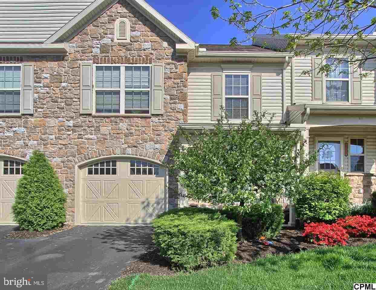 Welcome to this meticulously maintained townhome situated in highly sought after Winding Hills! This home boasts hardwood floors throughout the main level, Dining Room is open to the spacious Living Room with gas fireplace, Kitchen with granite countertops and center  island, Sliding glass doors lead to your private deck with backyard nestled in the adjoining courtyard.  Overflow parking lot perfect for guest parking! The second floor has 3 spacious bedrooms, 2 full baths with ceramic tile in each and your laundry area. Primary suite includes a whirlpool tub with jets, nice walk-in closet, and double sink. Full Basement has epoxied floor and provides space for future finishing or ample storage.  Home freshly painted, new carpet on upper level, new HVAC in 2023, new roof in 2022. This home is situated in award winning Winding Hills development, which has paved walking and bike paths, an in-ground community  pool with clubhouse, and a gym for residents only. Convenient location close to schools and shopping.