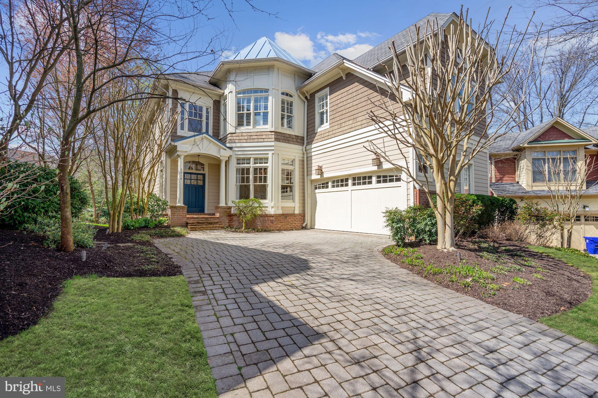 Fantastic one-of-a-kind location   incredibly close to everything yet nestled in a quiet tree-lined cul-de-sac of architecturally blended craftsman homes built by Yeonas & Ellis. One stop light to Key Bridge, GW Parkway, Reagan Airport and Alexandria; only 20 minutes to downtown DC in rush hour; and a stone s throw from trendy shops and restaurants. But also -- a three-block walk to a Y, with kids  gymnastic classes, a playground, basketball court, and track; walking distance to a grocery, Starbucks, CVS and the Italian Store; and an easy and delightful walk to the Potomac River and a Civil War park for nature hikes and picnics. This meticulously crafted Georgetown-style home is in mint condition, recently painted and carpeted   and with two-level entertaining is immediately ready for a bar-b-q or a catered dinner. The first floor presents tall ceiling heights, sand in place hardwood flooring, a gourmet kitchen with top of the line appliances, Viking range with a prep sink, wine cooler, granite counters, separate butler s pantry, a stone fireplace and a living room and family room both of which open to a spacious deck with a gas grill (and a gate for toddler or pet safety).  The second floor is designed with four bedrooms, all with private baths; a finished laundry room; and a master en suite bedroom which boasts two walk-in and Elfa-trimmed closets, an elegant bath and shower area with a private commode, plus an intimate study with custom shelving and 18 feet of floor-to-ceiling closet space. There s also a garden level with a spacious family room complete with custom shelving, another stone fireplace and French doors opening to a landscaped patio; an exercise room (or kid s playroom); a study (or fifth bedroom) with a bath and walk-in closet (or file room); and three storage areas. This unique home has an abundance of light with tree-top privacy, a natural flow for entertaining, illuminated landscaping, an exterior generator, and is the only property in the cul-du-sac that will accommodate a pool. One last and special feature is a homeowners association that provides year-round landscape and yard maintenance, including regular mowing, fall raking, snow removal and more, to maintain the uniform attractiveness of the entire cul-du-sac.  This beautifully staged home is a must see . . . and is available for immediate occupancy!