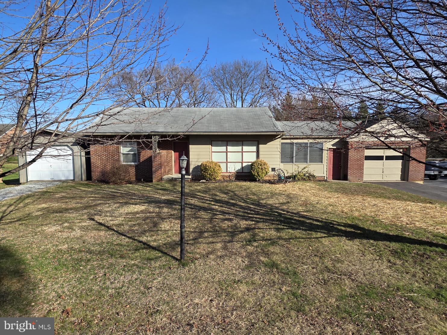 Built in 1957, this charming 2-bedroom, 1-bath brick rancher sits on a spacious 0.37-acre lot offering plenty of room for outdoor activities, gardening, or simply relaxing in your own backyard. Well maintained and move-in ready, this home reflects true pride of ownership and is an excellent option for buyers seeking comfort and reliability from day one.  Enjoy convenient main-level living with original hardwood floors (currently under carpet in some areas) that add warmth and character throughout. The functional eat-in kitchen is perfect for casual meals or morning coffee and flows seamlessly into living areas ideal for relaxing or entertaining.  A bright and airy breezeway provides an additional space to unwind.  The home features reliable heating with efficient baseboard units, complemented by a barely used natural gas furnace (when installed, it was used for only about 3 months, as the owner prefers baseboard heating). This setup provides low-maintenance comfort and potential cost savings for years to come.  The brick exterior is enhanced by an attached garage with an addition, plus a generous 12x24 shed offering endless possibilities for car enthusiasts, hobbyists or extra storage. The property has also been recently connected to public water.  If you're looking for a well-kept, dependable home in move-in-ready condition, this one is not to be missed!