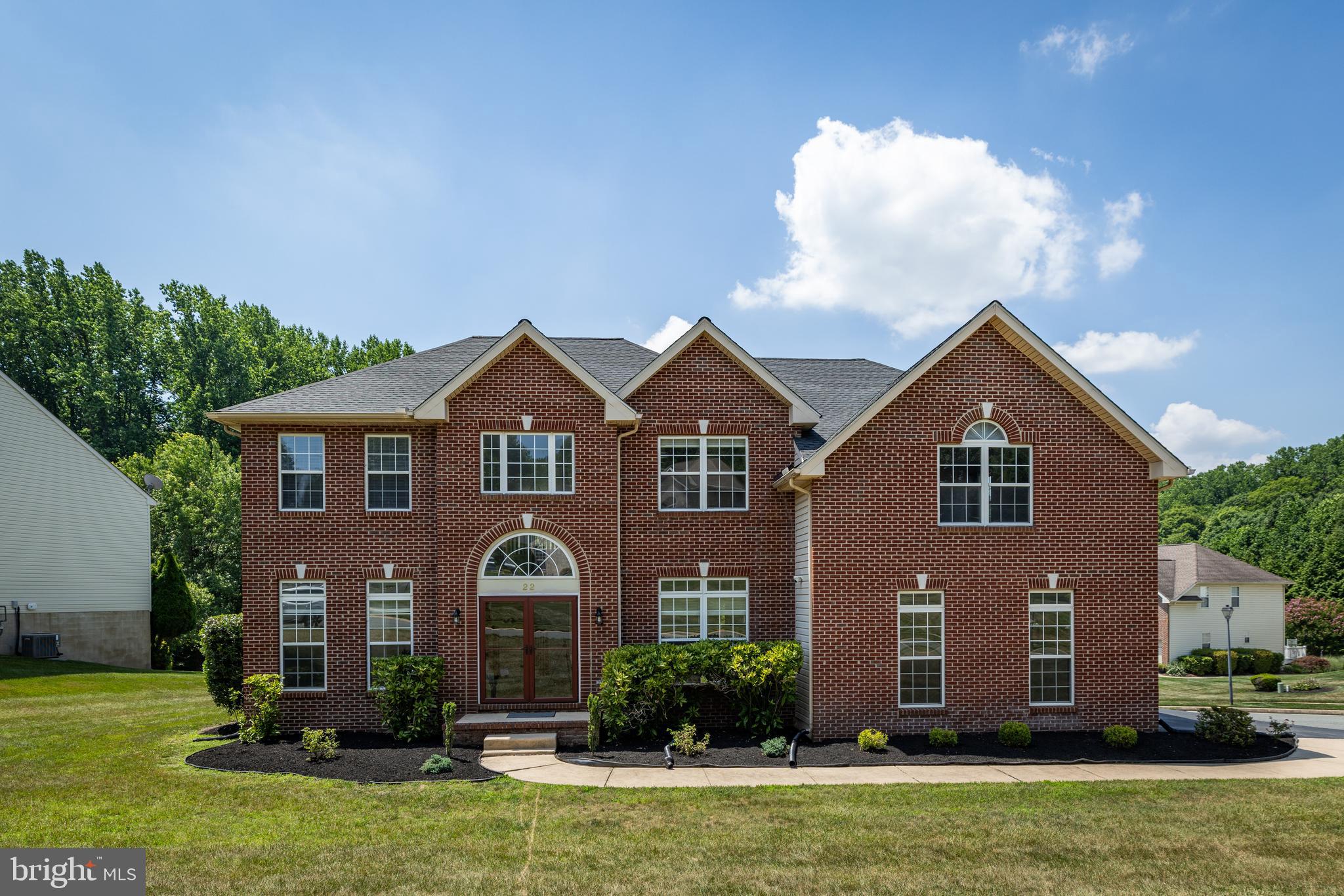 Welcome to this beautifully maintained brick-front colonial in a peaceful, scenic neighborhood that offers both comfort and convenience. New roofing and new appliances in 2025. Step inside to find a perfect blend of modern updates and classic charm. Fresh paint and an elegant deck make this home ideal for relaxation and entertaining. High ceilings and abundant sunlight create an open, airy atmosphere that enhances the space’s inviting feel. Perfect for families, the upper level features four spacious bedrooms, including a luxurious master suite with a walk-in closet, a sitting area, and an en suite bathroom. Three additional bedrooms offer plenty of space, with a shared full bathroom nearby. This home is conveniently located near local shopping, dining, and a playground, making everyday life easier. Inside, thoughtful details such as crown molding in the formal living and dining rooms, a cozy family room with a gas fireplace, and a gourmet kitchen with a center island and upgraded cabinetry enhance the living experience. A first-floor study, a two-car garage, and a spacious basement enhance the home’s functionality. This stunning colonial is ready to welcome you home, blending classic style with modern comfort. Don’t miss out on this incredible opportunity!