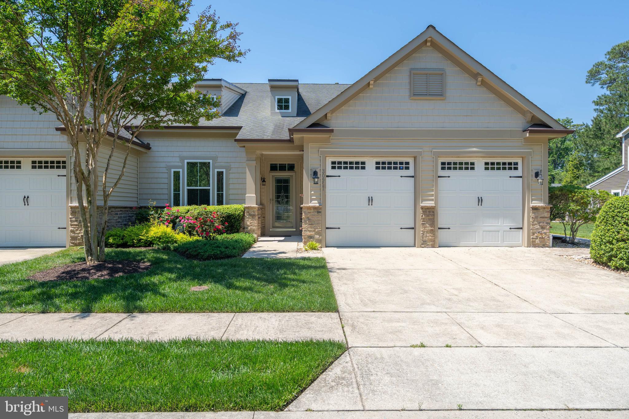 Beautiful 3 BD/2.5 BA NV Homes Severn End Unit Townhome with 2 Car Garage in award-winning Bay Forest. Partial stone elevation and twin dormer windows above. Leaded glass front door with transom opens into 2 Story Foyer with gleaming wood floors. This never-rented home may convey fully-furnished depending on the strength of an offer. The Great Room’s Cathedral Ceiling is brightened by the front window & blinds and two dormers above. Adjacent 2-story Dining Area features chair rail & box trim molding, a bay window with blinds viewing broad lawns, a chandelier and granite Kitchen pass-through. (Between Great Room & Dining Area is the Laundry Room & 2 Car Garage). A dining table for six sits on an area carpet with a pair of matching chairs nearby. There is a closet under the stairs and a Powder Room adjacent to Dining Room, Kitchen & Primary Bedroom. Kitchen: tray ceiling, recessed lighting, ceramic tile, upgraded cabinets, stainless appliances: new Samsung fridge; double oven, electric cooktop, DW, microwave. Kitchen island seats 2. There’s also room for a table and chairs. The Den beyond features a NG fireplace trimmed by slate & elegant wooden mantel with a TV above. The FP is flanked by windows with blinds. At left, a French door opens onto a paver patio with sitting walls viewing lawns & trees. (Patio furniture may convey.) The Primary Bedroom features gleaming wood floors, a tray ceiling with ceiling fan & light, recessed lighting, a triple window with blinds admitting lots of light. Large walk-in closet. Primary Bath: dual basin vanity, granite counters, upgraded cabinets. Plus large soaking tub, walk-in shower with built-in bench, beautifully-tiled. Stairway to second floor: gleaming wood risers and banister rise to large Loft, 2 Guest BDs with ceiling fans & lights share a Guest Bath. There’s also a Utility Area/Attic Space for the HVAC and storage. The home will convey Furnished Depending On the Strength of an Offer. Meticulously maintained, never rented, and rarely occupied by the Sellers, this Severn looks “like new.” More than $100,000 in improvements include new American Standard Heat Pump ($13,300), tankless hot water heater ($4,750), hardwood staircase ( $7,600), patio & walk to the front yard ($24,600), outdoor shower ($4,350), primary bedroom furniture suite ($6,200), full interior house painting ($14,200), five ceiling fans ($3,150), and more. New Owner Capital Contribution: $1,992. $395 annual charge for water/sewer infrastructure. The National Association of Home Builders (NAHB) named Bay Forest Platinum Award Winning "Best in American Living" community in 2019 as a community that "maximized water and green spaces and created a nice sense of micro-communities inside the natural habitat [with] lovely pool and resort-like amenities." So come enjoy our clubhouse with lounge, grille, game room, Women's & Men's lockers opening to 3 pools (Lazy River!). And 4 tennis courts (one easily reconfigured for pickleball) & tennis pavilion, outdoor basketball nets, children's play areas, putting green, bocce lawns, horseshoe pits, volleyball space & fire pit. Plus an incredible Recreation ‘Barn' accommodating a indoor basketball court, 3 pickleball courts or 450 guests for New Years Eve celebrations! The Barn opens to a Great Lawn, two more pools, a gym and dance/yoga studio (w/ resilient floors) with Men’s & Women’s changing rooms & gathering spaces. Plus our Kayak Launch w/ kayak storage & expansive Indian River Bay & Bay Bridge views. Our Herb Garden. Summer Beach Shuttle. Amazing Salt Marsh views from our wooden Shearwater Drive Bridge crossing Collins Creek to the Recreation Barn, Pools & Gym. 15+ Miles sidewalks. 5 Miles Bethany Beach. Complimentary 2-YEAR-HOME-WARRANTY ($1,300 VALUE!). PRICED 2 SELL! Come join us in a Platinum Award-Winning "Best in American Living" community, Bay Forest Club!