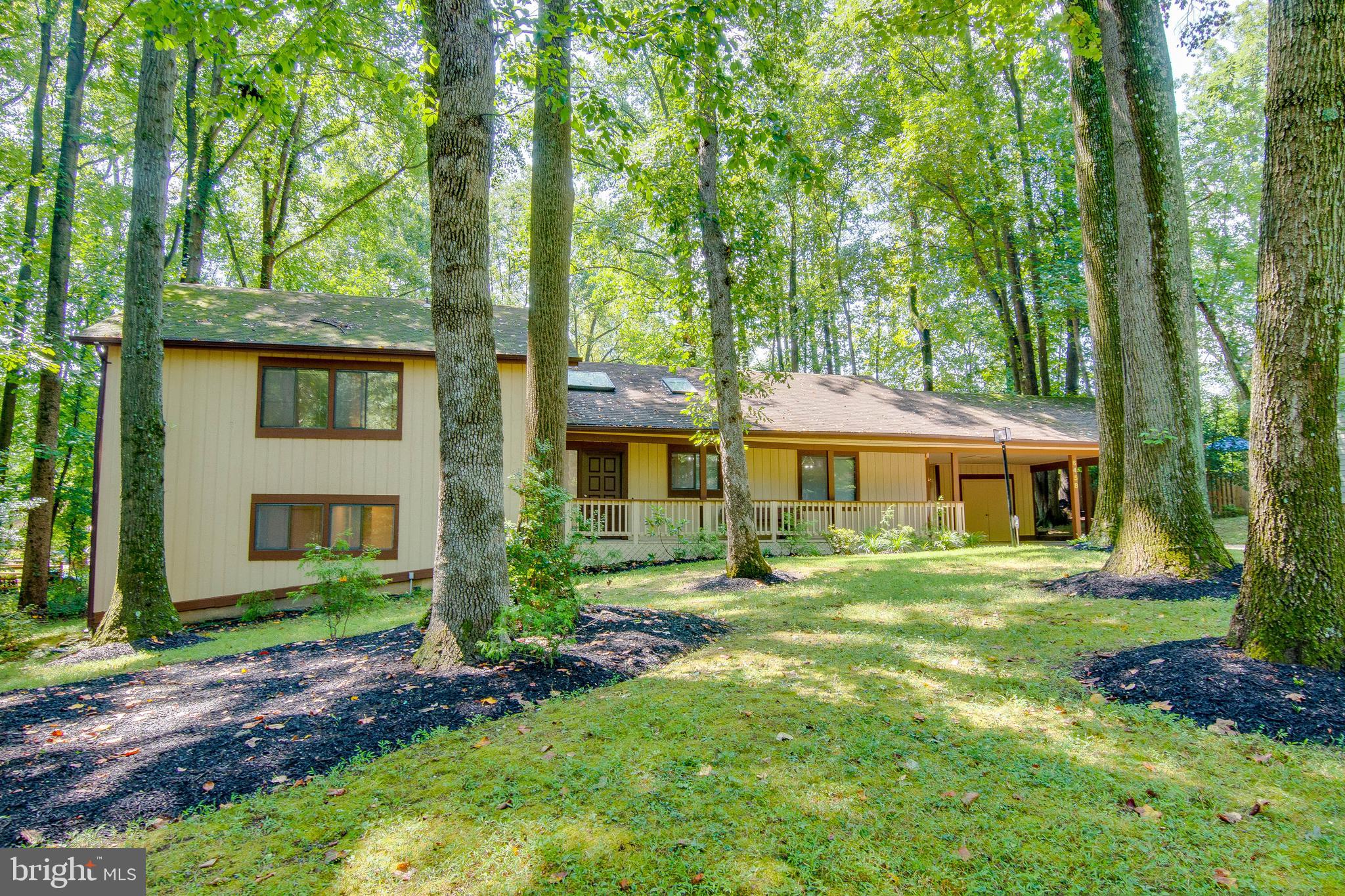 A Custom Contemporary Split Level Home nestled on a quiet tree lined cul-de-sac in one of Columbia's most sought after neighborhoods... Clemens Crossing. This beautiful home has been lovingly maintained and updated by Original Owners and is perfectly situated on a (Hard to Find) Half Acre Lot with mature trees. With approximately 3,000 Square Feet, this home offers a unique open layout with lots of natural light. Features include Fresh Paint, New Carpet and Hardwood Floors. Renovated Gourmet (Eat-In) Kitchen with Corian Counters, Stainless Steel Appliances, Cooktop and Double Wall Oven, Butler Pantry and Wine Fridge. Large Dining/Living Room Combo with Cathedral Ceilings and Skylights, Cozy wood burning fireplace and Double Sliding Doors which lead to an expansive deck overlooking a large rear yard perfect for playing and entertaining. Master Suite with walk-in-closet and Renovated Master Bathroom. Good sized Upper Level Second and Third Bedrooms and Renovated Hall Bathroom. An above grade lower level offers a large Recreation Room with slider to rear yard, 4th Bedroom with Full Egress and Full Bathroom and Laundry Room. Bonus second lower level basement with Play Room/Storage.    Perfect location centrally located just minutes from all kinds of shopping, restaurants, bike/walking trails, lakes, parks, golf courses, pools, gyms and the Hickory Ridge Village Center. The HOA Fee is for the Columbia Association which offers discounted membership to tons of amenities (pools, gyms, golf and more). Quick access to Rt.29//32/100/95/295 and conveniently located to both Baltimore and Washington.Just 15-20 minutes to Ft. Meade/NSA, 25 minutes to Baltimore, 35-40 minutes to DC. Great location for commuters!!!