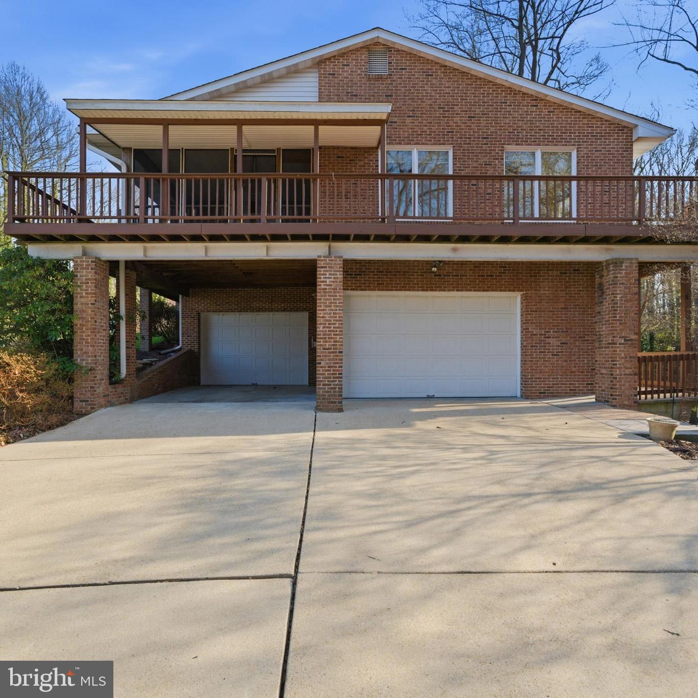2% Closing Cost Assistance Offered + Chesapeake Bay Views + Income-Producing Apartment | Western Shores - Please make appointment online - Home is Occupied. 

Welcome to a rare opportunity in the highly sought-after Western Shores community—where Chesapeake Bay views, solid construction, and an unbeatable coastal lifestyle come together.

Situated on a quiet cul-de-sac at the end of a dead-end street, this home offers privacy, minimal traffic, and a peaceful setting that’s hard to find. Enjoy stunning eastern-facing bay views, where each morning begins with breathtaking sunrises over the Chesapeake Bay—a truly special way to start your day.

The seller is offering a 2% closing cost concession, creating immediate value and flexibility for today’s buyers—an opportunity you don’t want to miss.

Inside, the home is built to last with steel beam construction, offering a level of durability and integrity rarely found. Spacious living areas, multiple gathering spaces, and a natural flow make this home ideal for both everyday living and entertaining.

Just off the kitchen, step into a bay-facing outdoor living space—perfect for morning coffee at sunrise, entertaining, or relaxing with peaceful water views throughout the day. The property also features low-maintenance yard space, two separate driveways, and an oversized garage, providing exceptional parking, storage, and flexibility for hobbies, boats, or equipment.

Designed for real life, this home shines for those who enjoy the outdoors or hands-on work. Rinse off after the beach, yard work, or a day in the garage in the outdoor shower with hot and cold water. For added functionality, the garage includes its own shower with a floor drain—ideal for mechanics, hobbyists, or anyone needing a true wash-down workspace.

One of the standout features is the fully functional lower-level apartment, previously used as a rental and ideal for Airbnb/VRBO income, multigenerational living, or private guest accommodations—offering real income potential and flexibility.

Adding even more long-term value, the home includes an owned solar array that covers most—if not all—of the home’s electric usage for much of the year, delivering meaningful energy savings without the burden of a lease.

Beyond the property, Western Shores offers access to a private community beach with beautiful white sandy shoreline, basketball hoop, pavilion, swings, and BBQ areas—perfect for relaxing, entertaining, and enjoying the Chesapeake Bay lifestyle.

Conveniently located just 15 minutes to local hospitals/emergency care, grocery stores including ALDI, shopping, and a variety of great restaurants, this home also offers an easy commute to Washington, DC (approximately one hour), as well as Joint Base Andrews and NAS Patuxent River.

Whether you’re seeking one-level living, income potential, multigenerational flexibility, or a home that blends nature, functionality, and craftsmanship, this property delivers. Built with strength and intention, it’s the kind of home that stands apart—solid, enduring, and thoughtfully designed.

From the cul-de-sac location and expansive parking, to the income-producing apartment, energy efficiency, and lifestyle-driven features, this property stands out as one of the best value opportunities in Southern Maryland today.