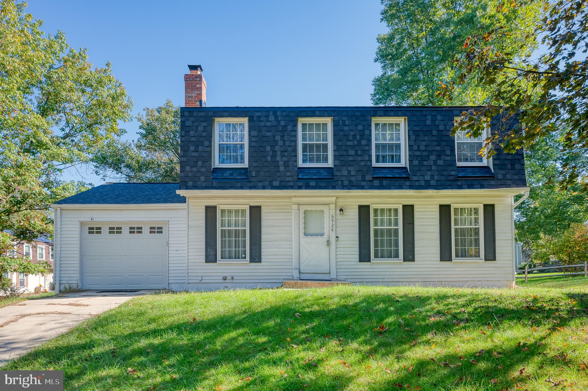 Welcome to this inviting 4-bedroom, 2.5-bathroom Colonial in the heart of the Village of Owen Brown, a community known for its convenient access to all that Columbia has to offer. Step inside to find hardwood floors that grace both the living and dining rooms, where a ceiling fan enhances the comfort of the space. The galley-style kitchen is both functional and stylish, featuring granite countertops, a double sink, and electric cooking. A cozy breakfast nook with its own ceiling fan sits next to sliding glass doors that lead out to a spacious deck, partially screened and covered—ideal for year-round outdoor enjoyment or hosting friends. The family room, with its warm hardwood floors and a wood-burning fireplace, offers the perfect place to unwind after a long day. A half bath with tile flooring adds convenience on the main level. Upstairs, the primary bedroom features laminate floors and an attached bath with tile flooring and a stall shower. Three additional bedrooms, each with laminate floors, provide plenty of options for guest rooms, home offices, or whatever suits your needs. A full bath with a tub-shower combo serves this level. Head down to the lower level, where the recreation room offers a great space for game nights, workouts, or lounging, complete with vinyl flooring and ceiling fans. Outside, the expansive deck is perfect for relaxing, whether you’re enjoying the open air or the comfort of the covered, screened-in section. The home also includes an attached 1-car garage and a driveway that fits two additional vehicles. Located just minutes from Columbia’s scenic parks, trails, lakes, and a variety of shopping and dining options, this home offers the ideal balance of indoor comfort and outdoor lifestyle. Don’t miss the opportunity to make it your own—schedule a tour today!