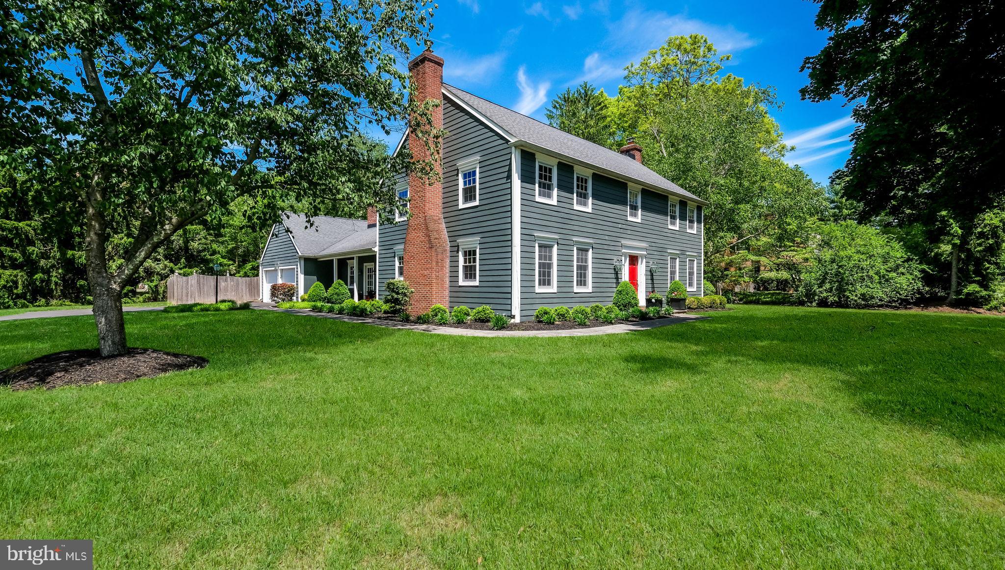 Welcome to 10 Fairfield Lane in Foxcroft—one of Doylestown’s most established neighborhoods, known for its exquisite Custom-Built Colonial homes, manicured grounds, and magnificent mature trees!  Foxcroft appeals to buyers seeking timeless architecture, privacy, land, and the character that only an established neighborhood can offer. Perfectly positioned on one of the most coveted lots in the neighborhood, 10 Fairfield Lane has exceptional curb appeal and a setting that feels both refined and welcoming. Family and friends enter through the charming side entrance with its inviting Covered Porch—setting the tone for the warmth found throughout the home. Step into the cozy Keeping Room featuring exposed beams and a walk-in fireplace, creating the perfect gathering space for quiet evenings or morning coffee. Just beyond is the beautifully updated Gourmet Kitchen complete with Bucks County soapstone countertops and island, stainless steel appliances, a wine refrigerator, and a spacious Breakfast Nook ideal for everyday living. The gracious Dining Room is perfectly suited for hosting holiday celebrations and family gatherings. The Living Room features a stunning brick fireplace and flows seamlessly into the sun-filled step-down Family Room where skylights and a THIRD fireplace create an inviting space for relaxing or entertaining. French doors open to the backyard retreat featuring an in-ground pool, pattern concrete patio, and beautifully landscaped grounds. Spend summer days by the pool, entertain outdoors, or unwind beneath the magnificent 20-year-old Sugar Magnolia tree. The Laundry Room and Powder Room are conveniently located just off the pool area—perfect for busy family life and summer entertaining—while the attached TWO CAR Garage offers easy access just beyond the Laundry Room. The Grand Foyer welcomes you with a beautifully turned staircase leading to the second floor, where the spacious Primary Suite offers a retreat with a wall of custom closets accented by sliding barn doors and an updated Primary Bath featuring a double vanity and beautifully tiled shower. Three additional generously sized Bedrooms, an updated Hall Bath, and a cedar closet complete the second floor—providing plenty of space for family, guests, or a home office. The Finished Basement offers extra living space and storage PLUS  eight reclining theatre chairs for movie night and sleepovers! Outside, enjoy your private in-ground pool and beautifully fenced backyard surrounded by manicured landscaping, flowering trees, and established gardens. Ideally located just minutes from Doylestown, New Hope, and major commuting routes, this exceptional property is also within the highly acclaimed Central Bucks School District. 10 Fairfield Lane offers the rare chance to become part of one of Doylestown’s most treasured neighborhoods, where homes are tightly held and rarely available.