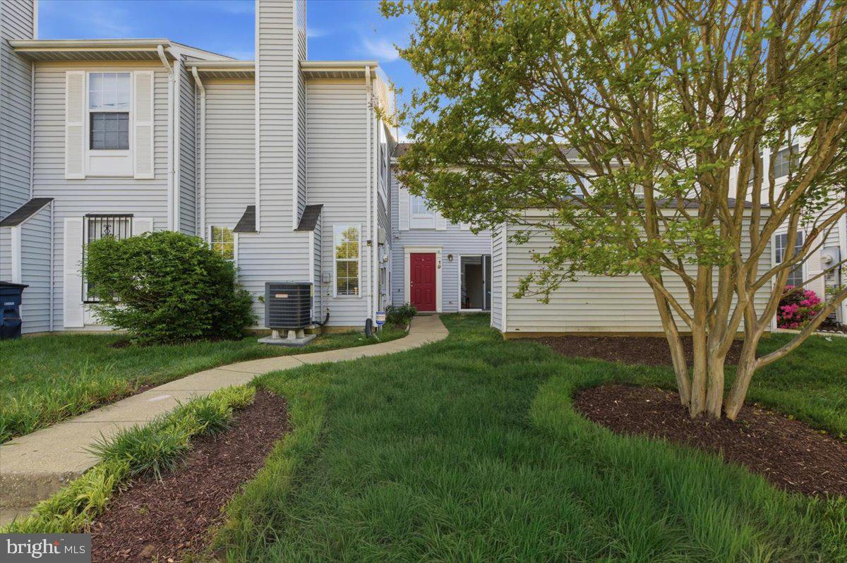 *****Price Improvement***** Welcome to this charming two-level, townhouse-style condominium.

Step inside to a bright, freshly painted and inviting living area filled with natural light from large windows, seamlessly flowing into an equipped kitchen featuring granite countertops and a newer built-in microwave. The adjacent dining area showcases updated laminate flooring, creating a stylish and comfortable space for everyday living and entertaining, with easy access to the front outdoor area.

Upstairs, you’ll find two generously sized bedrooms and two full bathrooms, offering both comfort and privacy.

Enjoy a thoughtfully designed layout in a prime location with convenient access to major commuter routes, as well as nearby shopping, dining, and everyday amenities.