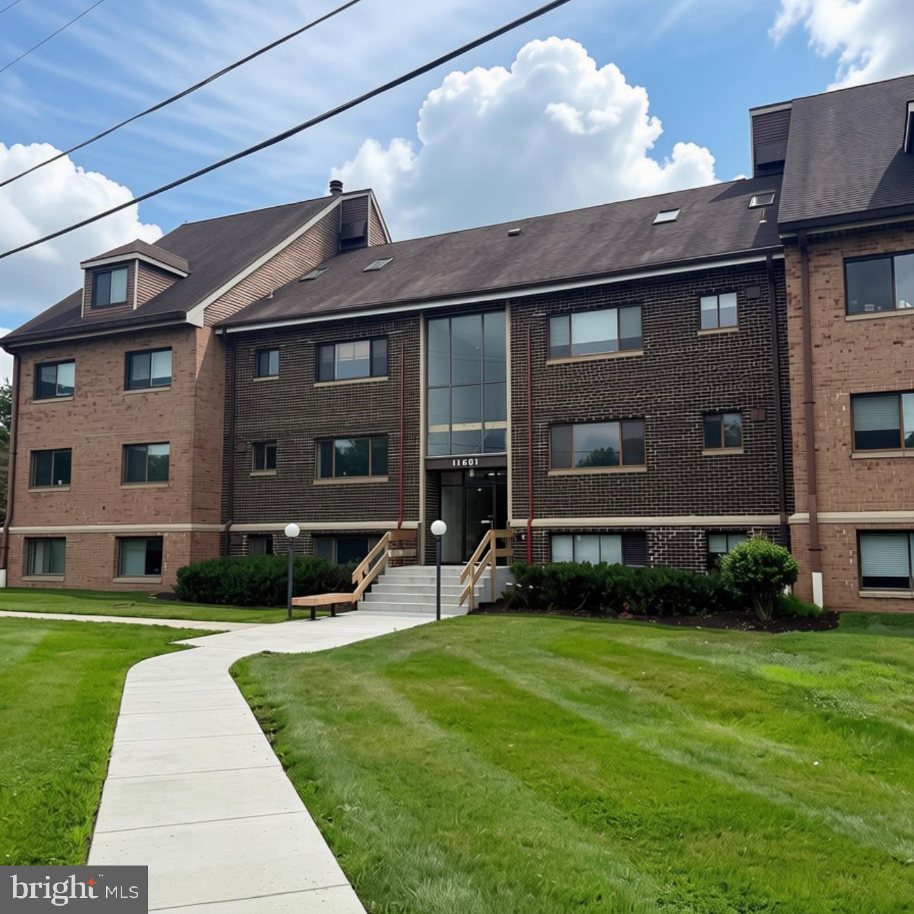 Welcome home to this spacious 2-bedroom, 1-bath ground-floor condo in a secure, well-maintained building in Silver Spring. Featuring a generously sized living room, this home offers comfortable everyday living in a quiet, beautifully kept community with convenient access to public transportation, shopping, dining, and major commuter routes. Residents enjoy fantastic amenities, including a swimming pool, clubhouse with a kitchen, playground, and beautifully landscaped common areas, making this condo the perfect blend of comfort, convenience, and community.