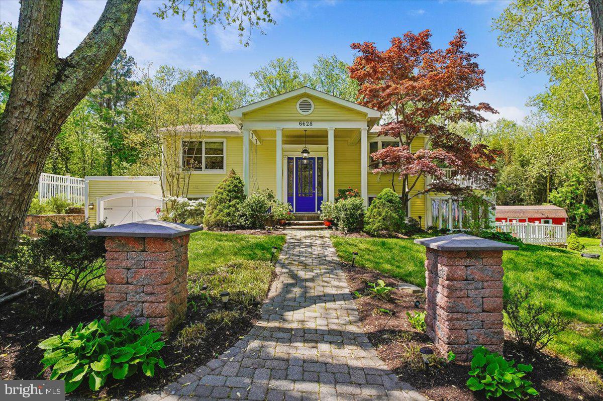 Tucked away in the peaceful waterfront community Fair Haven in Tracys Landing, this charming home at 6428 Weems Avenue offers the perfect blend of coastal serenity and everyday comfort. Surrounded by mature trees and just moments from the Chesapeake Bay, this home invites you to slow down and enjoy the best of Maryland’s shoreline living—now elevated with direct views of the Bay and access to the community beach less than 100 yards away.

Step inside to discover a warm, inviting interior with abundant natural light, spacious living areas, and thoughtful details. A bright sunroom is perfect for Chesapeake views and year-round relaxation, while the primary suite is a true retreat with a private balcony, a cozy fireplace, and a luxurious bath with a jetted tub and walk-in shower. Whether hosting friends or enjoying a quiet evening, the layout offers both functionality and comfort. The kitchen anchors the home, ready for casual breakfasts or weekend gatherings, with propane for cooking and backup heat for peace of mind. A state-of-the-art, energy-efficient HVAC system ensures comfort and lowers energy costs.

Outside, the property truly shines. A private pool anchors the space, paired with extensive hardscaping low-maintenance hardscaping. Entertain effortlessly with a fully equipped outdoor kitchen and fireplace, or simply relax and enjoy the tranquil surroundings, birdsong, and sweeping water views. The expansive yard offers endless enjoyment: garden, entertain, or unwind in private serenity.

Ideal as a full-time residence or a weekend retreat, this home offers a rare opportunity to experience laid-back coastal living within reach of Annapolis, Washington, D.C., and beyond. Come see what makes this hidden gem so special.