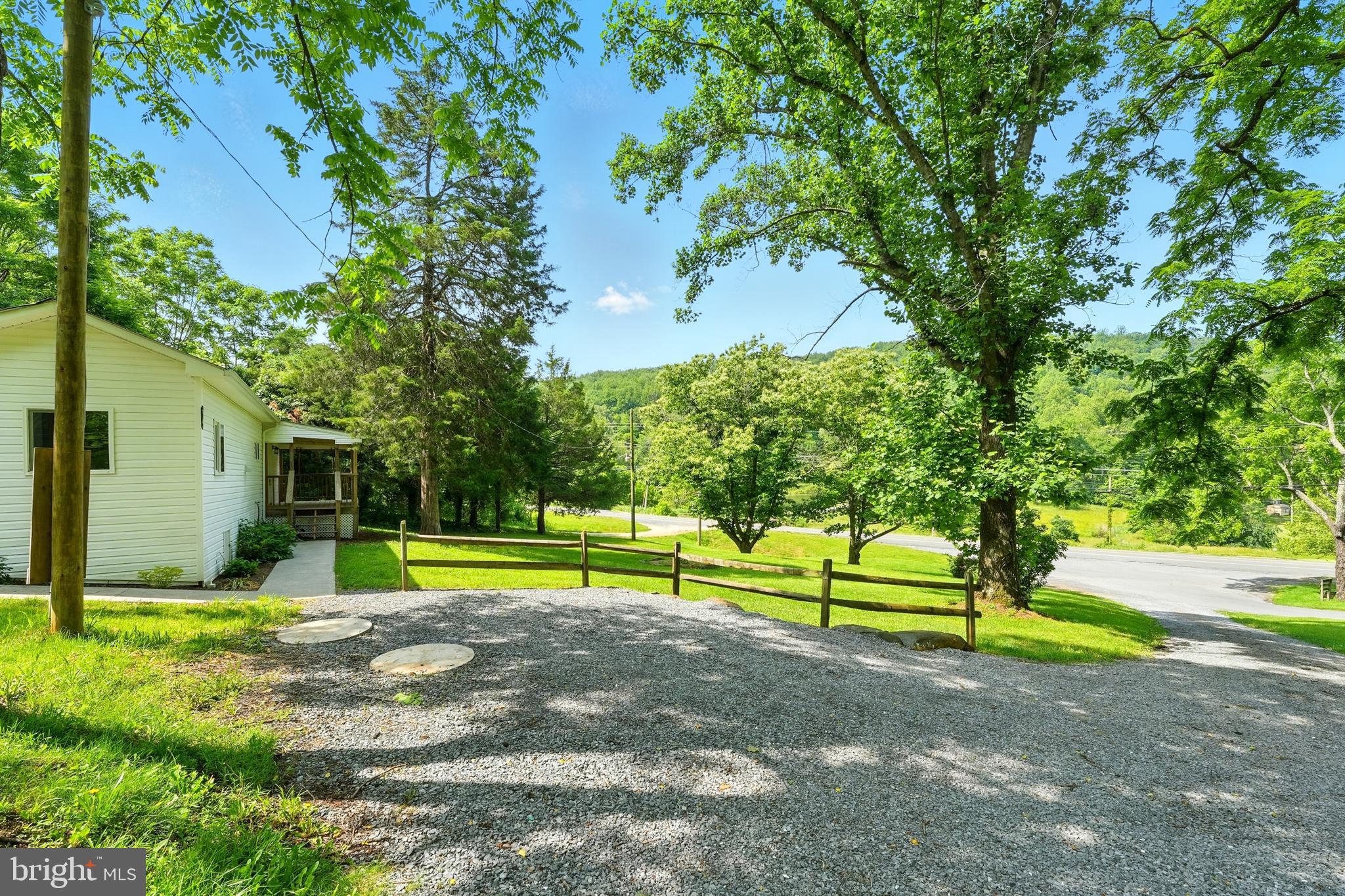 Charming Renovated Cottage in Front Royal
1 ACRE | MODERN UPDATES | MINUTES TO APPALACHIAN TRAIL & DOWNTOWN
If you’ve been dreaming of a cozy retreat with a modern touch and a connection to nature, this delightfully renovated 2-bedroom, 1-bath cottage on a private 1-acre lot in Front Royal may be your perfect match.
This home has been thoughtfully updated with all new appliances, on-demand hot water, mini wine fridge, and sleek updated cabinetry and countertops in a bright and functional kitchen. The entire interior has been freshly painted, and comfort is ensured year-round with brand-new mini splits for heating and cooling.
In the living room, a cozy nook awaits your wood stove—just imagine curling up with a book after a day on the trail. Step outside and enjoy your own private slice of nature: a beautiful stone wall lined with wild bramble berries behind the home, and two majestic chestnut trees welcoming you in the front yard.
Location perks: Only 1 mile to an Appalachian Trailhead—ideal for hikers and outdoor lovers. Short drive to downtown Front Royal with local restaurants, art, and live music. High-speed internet available—so you can stay connected while tucked away in peace.
This property offers the best of both worlds—rural serenity with modern comforts and vibrant small-town culture just minutes away. Whether you're seeking a full-time residence, weekend getaway, or a stylish short-term rental, this lovingly updated home is move-in ready and full of charm.
 A rare blend of style, simplicity, and natural beauty—come make it yours.
No HOA