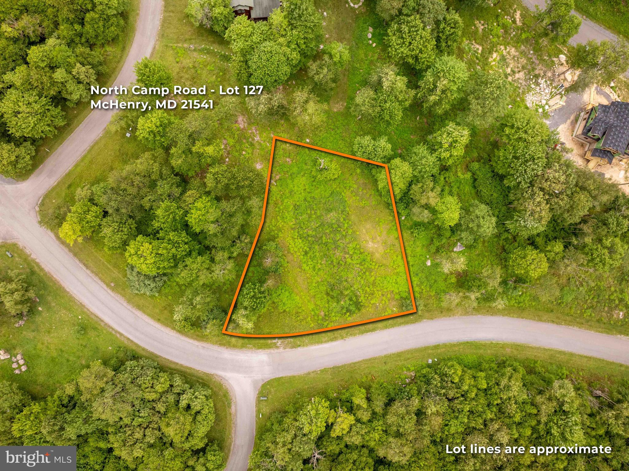 Build Your Mountain Escape in North Camp! 

Lot 127 is a prime homesite in the highly desirable North Camp community, offering exceptional access to all that Deep Creek Lake and Wisp Resort have to offer. Just a short walk to the North Camp ski slopes, you'll enjoy convenient access to popular runs including Big Dipper, Ace's Run, and Over-the-Edge, as well as the nearby ASCI Whitewater Course.

This beautiful, level, wooded lot provides the perfect setting for your custom mountain retreat, with stunning sunset views and public water and sewer already available. Outdoor enthusiasts will also appreciate being just moments from the 550-acre Fork Run Recreation Area, featuring miles of hiking and biking trails.

Whether you're planning a vacation getaway or a full-time mountain residence, this exceptional homesite offers the ideal blend of adventure, convenience, and natural beauty.
