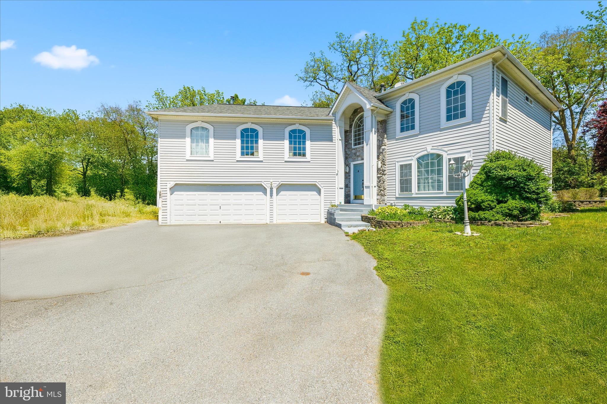 Welcome to this exceptional 3 bedroom + a den,  2.5-bath residence tucked away on a quiet cul-de-sac on 1/3  acre in a sought-after neighborhood, where thoughtful landscaping, mature trees, and a private backyard retreat create a peaceful setting just moments from shopping, dining, schools, and major commuter routes. Step through the grand double-door entry into a home designed for both elegant entertaining and everyday comfort. A gracious two-story foyer welcomes you inside, where a fresh neutral color palette and newer plush carpeting create a bright, inviting atmosphere throughout.
The open floor plan flows effortlessly from room to room, beginning with a sun-filled living room adjacent to the dining room, where expansive windows create a warm and welcoming setting ideal for quiet conversations, morning coffee, or simply enjoying the sunrise. The dining room is enhanced by crown molding, chair railing, and an elegant chandelier, creating the perfect backdrop for gatherings and special occasions. Beyond, the dramatic two-story family room is wrapped in windows that allow natural light to pour through the space, while built-in shelving and a sleek gas fireplace add warmth and sophistication. The upper-level Juliette balcony overlooks the family room and guides you to a versatile loft ideal for a home office, studio, or reading retreat.
The thoughtfully designed kitchen with granite countertops opens seamlessly to the main living spaces and French doors lead to the outdoor oasis featuring a two-tier paver patio, refreshing heated in-ground pool, privacy fence, pool house, and beautifully landscaped grounds backing to trees for added serenity and privacy.
Retreat to the luxurious primary suite through its double-door entry and enjoy newer plush carpeting, Palladian windows, a walk-in closet, and a striking double-sided gas fireplace shared with the spa-inspired en suite bath. The bath boasts a jetted soaking tub, separate shower, water closet for additional privacy, and dual vanities. Two additional sunny bedrooms and a full bath complete the upper-level sleeping quarters.
The fully finished lower level is an entertainer’s dream, offering an expansive recreation room with a built-in full bar and abundant space for game days, movie nights, and celebrations. A fourth bedroom and full bath provide ideal accommodations for guests, extended stays, or multigenerational living.
Blending timeless style, spacious living, and resort-inspired outdoor amenities, this remarkable home offers the perfect balance of privacy, luxury, and convenience.
Note:  Select interior photos have been virtually staged