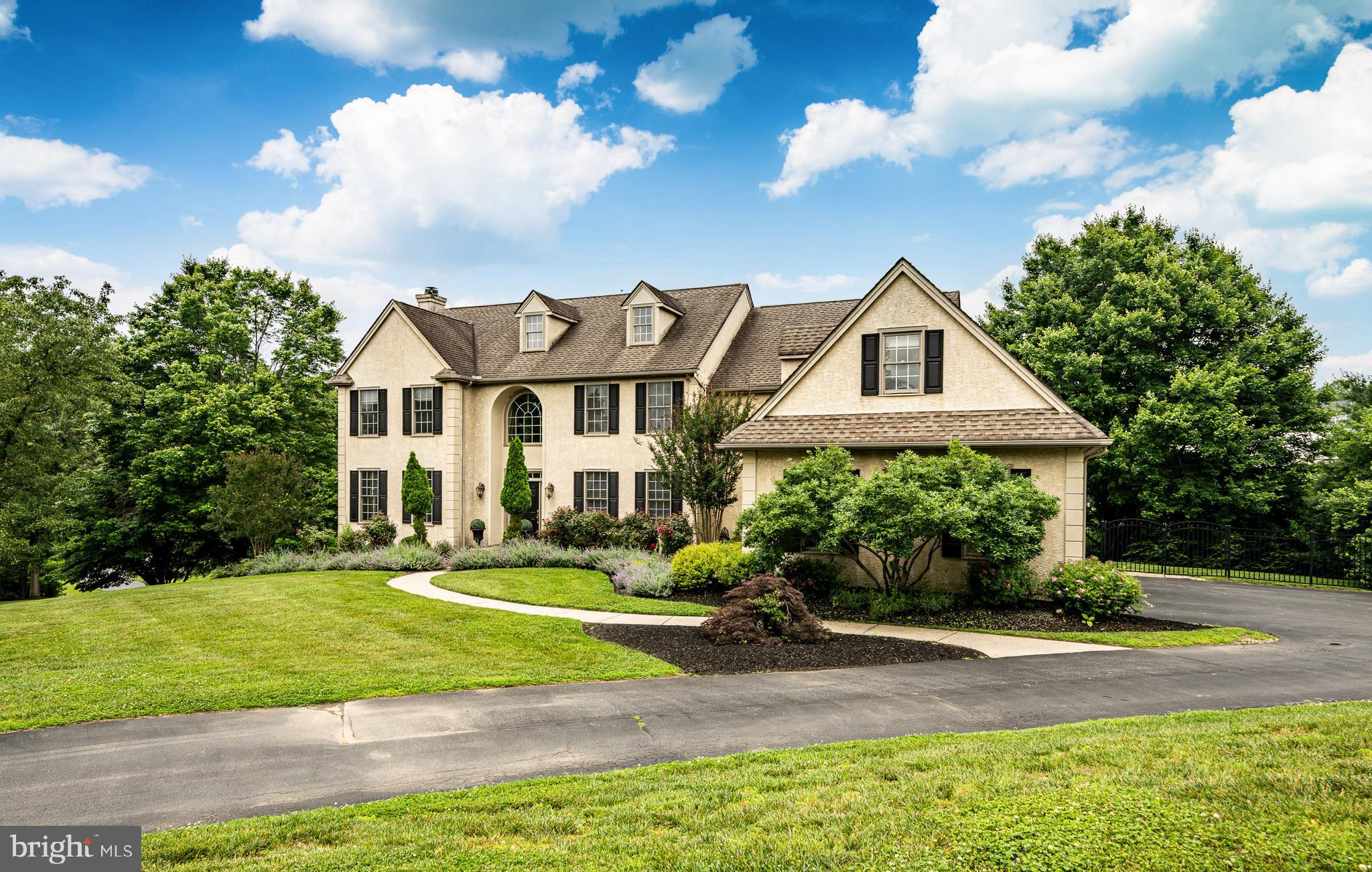 Simply stunning is how to describe 4 Taylor Chase Lane best. The home is situated on top of a hill with beautiful views over the surrounding countryside, in an enclave of just four homes on a private road. No detail from the gorgeous hardwood floors, high ceilings, crown moldings, and more has been missed. On the main floor is a living room, dining room, and family room with a vaulted ceiling and fireplace. The home office is spacious, private, and has a fireplace.  The large kitchen features Wolf appliances and a large breakfast room overlooking the backyard. There is a large deck off the kitchen. 
The upper floor has a primary suite with a sitting area that offers a large window overlooking the rolling fields. There is also ample walk-in closet space and a great en-suite bathroom. 
The second and third bedrooms share a jack-and-jill bathroom. The fourth bedroom has a full en-suite bathroom. The flex space would be good for a fifth bedroom, home office, or more. 
The lower level has a large rec room, full bathroom, workout area, fireplace, and French doors leading out to the patio and custom stone pool. The backyard is a beautiful escape where you can relax by the pool.  Located in the award winning Unionville-Chadds Ford school district with easy access to Rt 202, Rt 1, West Chester, Wilmington and Philadelphia.