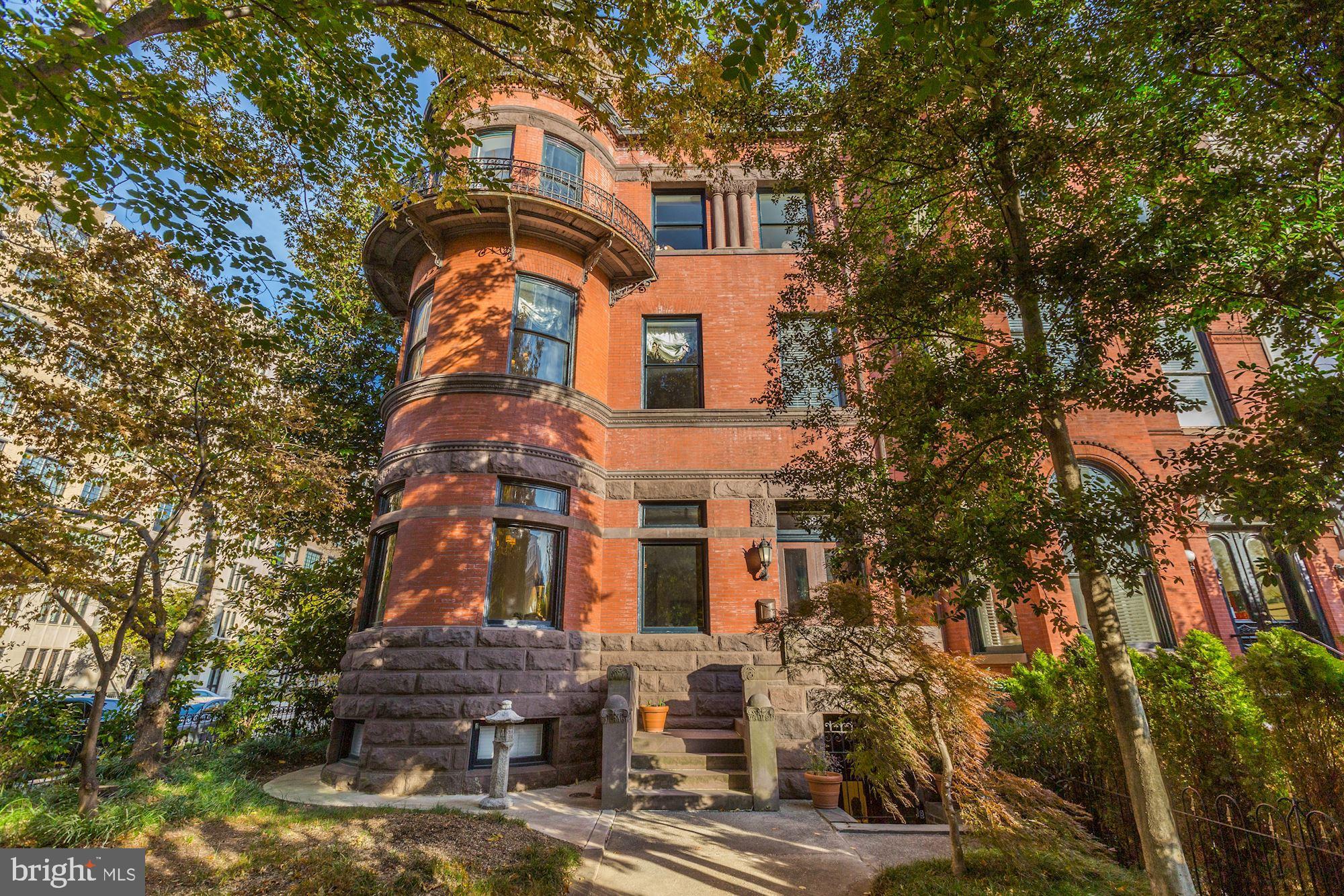 Downton Abbey West! This is a once in a generation opportunity to own a historic Dupont Mansion prominently sited on the corner of 16th and R Street and designed by Bruce Gray in the 1880s in the Richardsonian Romanesque tradition. It is a massive property with 10-12 BR/6 1/2 BA, soaring ceilings with over 9000 sf combining a heavy stone rusticated exterior with delicate beauty as seen in the foliate decoration of the columns.  The medieval conical tower and rounded windows have French-inspired wrought-iron balconies. The asymmetrical composition, rusticated surfaces, sandstone walls, belt course, and entablature are all common to Queen Anne houses of this period.  However, they are seen here in a particularly felicitous combination that makes the house absolutely unique, even in Washington.  In addition to the main house, there is a carriage house, an au-pair suite, garage parking space, and one surface parking space. The former Embassy of Bolivia, and later Ecuador, it is one of the largest townhouses over 9,000+ square feet in the Dupont/Logan area. Many cultural resources and neighborhood parks are nearby. The Dupont Metro and the U Street Metros are short walks.