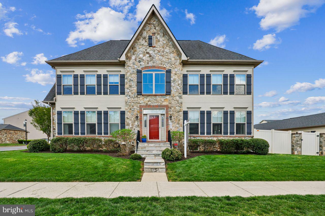 Welcome to this spacious end-unit townhome at Wormans Mill. Enjoy the open-concept living built for entertainment and relaxation. The inviting foyer opens into the cozy living space that includes the dining area and great room with a gas fireplace, separated from the kitchen by an island with seating. All stainless steel appliances complement the hardwood floors, warm cherry cabinets, and granite countertops. The primary bedroom suite on the first floor is spacious, with a walk-in closet and a private bathroom with a large walk-in shower, and double sinks.  The laundry room with a washer, dryer, and storage is also conveniently located on this level. Two additional bedrooms and a full bath are located on the second level. The lower level is unfinished but ready for easy buildout.  There is a fenced-in courtyard off the first level that leads to the two-car garage. Near historic Frederick and Carroll Creek events. Don’t miss this opportunity to visit this gem and check out the bountiful amenities that Wormans Mill offers, such as the clubhouse with a workout room, large living room/library, and full kitchen. Other amenities include tennis courts, a pool, pickleball courts, and basketball courts. Located near multiple major highways, shopping, and restaurants. MOVE IN READY!
