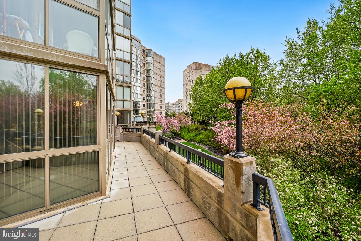 Welcome to Unit 123 in the Riverview building of Lansdowne Woods! This charming unit has an incredibly functional floor plan, sunroom and extensive outdoor patio - one of the few in the community! With 2 generously sized bedrooms, a kitchen with table space and access to the sunroom and open living/dining area this unit has everything you need. The large laundry room, sunroom and sought-after outdoor space make this truly special. The oversized garage space is one of the closest to the building entrance. If you're looking for ease and convenience, this is the PERFECT unit for you! On top of ALL the special features in the unit, Lansdowne Woods has so many incredible amenities for you to enjoy! There are over 50 clubs and groups, religious services, speakers, community dinners, and on-site and virtual fitness classes. The clubhouse includes a restaurant and bar, hair salon, gym & exercise studios, tennis and pickleball courts, art studios and so much more! You HOA dues include on-site services, twice annual HVAC system checks and your Comcast tv & internet service. This is a great opportunity for you to streamline your life without compromising on your lifestyle! You do not want to miss it!