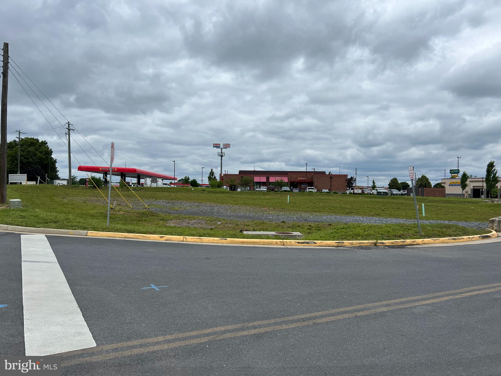 Interstate Commercial Lot for Sale:  1-acre +/- parcel zoned B2 with potential to rezone to B3.  Graded pad with all utilities to site.  Ideal for restaurant, retail business, etc.  Interstate signage opportunity.  Neighbors include Sheetz,  National Tire and Battery, Highway 55 Burgers and Shakes, and a 78 room Wyndham Microtel Hotel.  The area is also home to FEMA, Amazon Distribution Center, Proctor and Gamble, and a long list of other national companies.  See other documents for site plan.  Owner is a licensed agent in Virginia.