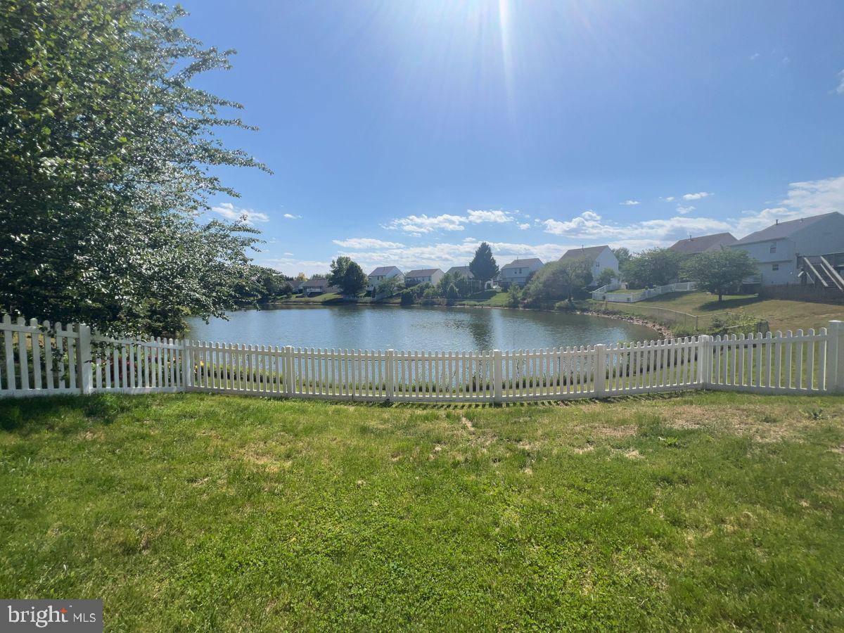 Welcome to your new sanctuary! Nestled on a serene cul-de-sac, this stunning 3-bedroom, 3.5-bath home is the perfect blend of comfort and luxury. With a prime waterfront location and a fully fenced backyard, this property offers the ideal setting for both relaxation and entertaining. Step inside to discover a bright and airy open-concept layout that seamlessly connects the living, dining, and kitchen areas. Natural light floods the home, highlighting the elegant finishes and modern design. The heart of this home is the beautifully renovated kitchen, complete with a generous island that invites family gatherings and culinary adventures. Equipped with stainless steel appliances, sleek countertops, and ample storage, this kitchen is sure to inspire your inner chef! The fully finished basement is a standout feature of this home, offering two additional rooms that can easily serve as bedrooms, a home office, or a playroom. The luxury bath in the basement adds convenience and comfort for guests or family members. Enjoy warm summer evenings on the spacious back deck in your fully fenced backyard, perfect for hosting barbecues or simply soaking in the tranquil waterfront views. This gem is conveniently located near commuter routes, making it easy to access Ft. Detrick, FMH, and downtown Frederick. Explore Frederick's vibrant local culture, shopping, and dining options just minutes away while still enjoying the peace of suburban life. No pets.