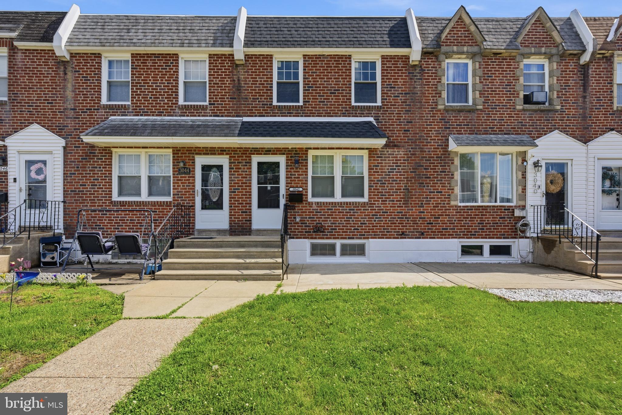 Welcome to this beautifully updated 3-bedroom rowhome located in the desirable Academy Gardens area of Northeast Philadelphia. This move-in ready home features a modern open-concept layout with a seamless flow between the living room, dining area, and updated kitchen, all enhanced by stylish finishes throughout. Step into a bright and inviting living space filled with natural light, wide-plank flooring, and recessed lighting. The kitchen is a true highlight, featuring sleek cabinetry, quartz countertops, stainless steel appliances, and a large island with additional seating—perfect for both everyday living and entertaining. Designer pendant lighting and contemporary fixtures add warmth and sophistication to the space. The home offers two fully renovated bathrooms with modern, high-end finishes. The main bathroom provides a spa-like feel with marble-style tile, a skylight, and custom lighting details, while the additional bathroom in the finished basement features a sleek walk-in shower and contemporary design, adding both convenience and functionality. The second floor showcases a stylish hallway with a custom accent wall, leading to well-sized bedrooms with updated flooring, ceiling fans, and ample closet space. The spacious primary bedroom features a striking accent wall with elegant panel detailing and designer lighting, creating a comfortable and modern retreat. Beyond its stylish interior, the home also offers major system upgrades, including a new electrical system, new plumbing, a new heating system, and a new roof—providing peace of mind for years to come. The finished basement adds valuable living space, while a 1-car garage with driveway offers added convenience. Situated on a well-maintained block, this home is ideally located near Holme Crispin Park, further enhancing its appeal with access to outdoor and recreational space. Don’t miss the opportunity to own this beautifully upgraded home—schedule your private tour today and experience all it has to offer.