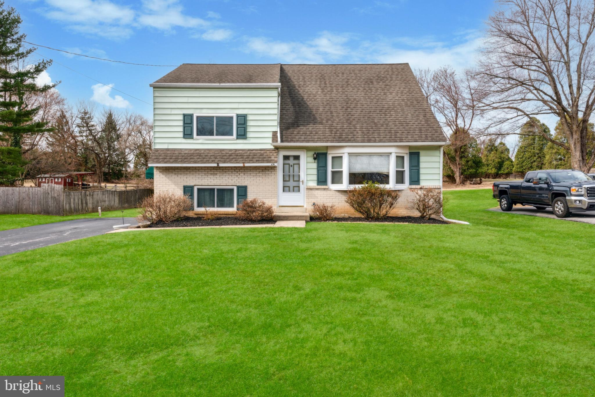 Welcome to this well-maintained 4-bedroom, 2-bathroom split-level home in Malvern, tucked away on a quiet dead-end street with no through traffic. Sitting on over three-quarters of a flat acre with public water and sewer, this property offers both space and convenience in the highly sought-after Great Valley School District.

The location is ideal, with parks, trails, and top-rated restaurants just minutes away. Outdoor enthusiasts will love the proximity to the Chester Valley Trail, while commuters will appreciate easy access to major routes including Route 202, Route 30, and the PA Turnpike, making travel to King of Prussia, Philadelphia, and beyond a breeze.

Step through the front door into a bright and inviting living room, where a large bay windows fills the space with natural light. The open kitchen and dining area create a seamless flow, featuring a new laminate floor (kitchen) and access to a covered and enclosed porch, perfect for year-round enjoyment. Just a few steps down is a spacious versatile room that can serve as a home office, family room, bedroom, or playroom with direct access to the driveway, and a full bath. To complete this lower level, there is a dedicated laundry room with a wash tub and utilities.

Upstairs, two well-sized bedrooms and a full bath offer comfortable accommodations and a linen closet. A few more steps lead to a larger bedroom with walk-in closet. The final level completes the home with a fourth bedroom or office space and plenty of storage. Throughout the home, the original hardwood floors—recently  revealed beneath the carpets—are in excellent shape, adding warmth and character.

Well cared for over the years, this home features an HVAC system replaced in 2020 and serviced in 2024, windows updated in stages over time, and freshly installed carpets in the lower level. You will also note there are nooks and crannies for storage in every space possible throughout. Ceiling fans are located in the bedrooms, dining room and covered porch for added convenience in the home. With its spacious layout, prime location, and quiet setting, this home is a fantastic opportunity for buyers looking to add their personal touch. Don't miss your chance to make it your own—schedule a showing today!