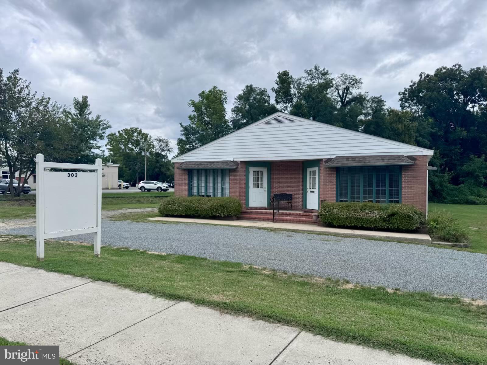Great investment opportunity in a highly visible area.   The property is on part of Rt 304 (E Water St,) which runs through Centreville with ample parking, next to the old Centreville railroad line. (Easement is on left of the building) Close to restaurants, walking distance to Post Office, Public Library and downtown Centreville. In the past was 2 separate businesses, has been   Ice Cream shop, laundromat,  specialty supplies, real estate offices and accountant office.  ½ bath and kitchen coffee bar on each side.  Circular driveway in front and around building so works for deliveries for back or front of building.   Designed with locations for private offices, work stations and a great welcoming entrance area with a built-in desk. Small deck on back of property. There is also a large garage storage area in back of the building with lighting, concrete floors and garage door   Currently rented so appointments need to be made in advance