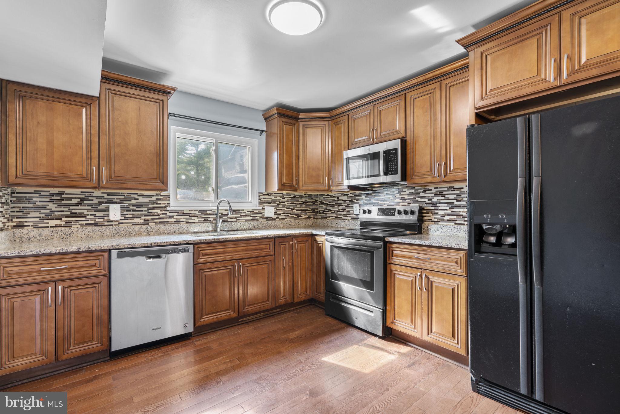 **10k IN SELLER HELP W/ FULL PRICE OFFER** Beautiful three-level townhouse style condo with many updates! Spacious Living and dining area, with newer hardwood floors update light fixtures and a chimney. The kitchen has been updated to include newer cabinets, lighting fixtures, granite countertops, stainless steel appliances. The upper level features a large master bedroom, with a master bath, and plenty of closet space, two additional bedrooms with an updated bathroom. The lower level features a bedroom a new silver color LG washer and dryer purchased in 2025. Conveniently located, near shopping centers, restaurants, surrounded by parks and trails. Easy access to I-270. You don't want to miss this one!