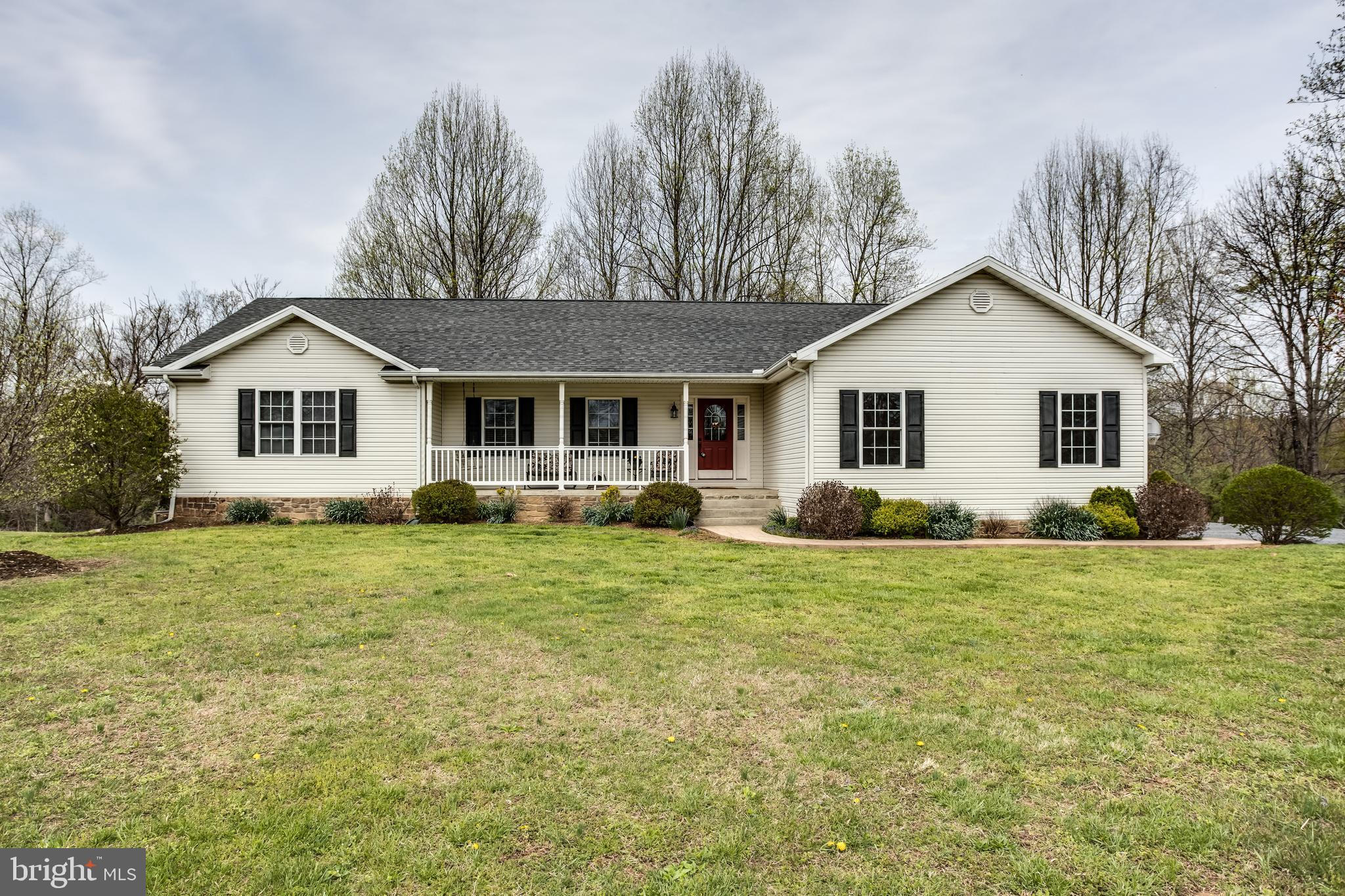 Here is an immaculate 3 BR 2 full bath well cared for rancher in pristine condition on 2.35 private acres with Sleepy Creek running through the back of the property.  Outdoor adventures abound on this property with plenty of deer and turkey hunting, fishing in Sleepy Creek, kayaking, swimming, tubing, and in walking distance to the Tuscarora hiking trail.  This spacious home features a large kitchen with granite counter tops, stainless steel appliances, and a breakfast bar.  House has a beautiful gas fireplace, cathedral ceilings, and exquisite lights, fans and fixtures.  Large bedrooms with ample closet space.  Master suite has his and hers closets and additional walk in closet.  Oversized unfinished basement has walk out french doors to rear patio and a workshop with shelving.  Beautifully landscaped grounds, covered front porch, back deck, and garden sitting area allow for plenty of outdoor entertainment.  Attached 2 car garage and main level laundry.  All appliances convey. No HOA!  This house comes with a 1 year Home Warranty.