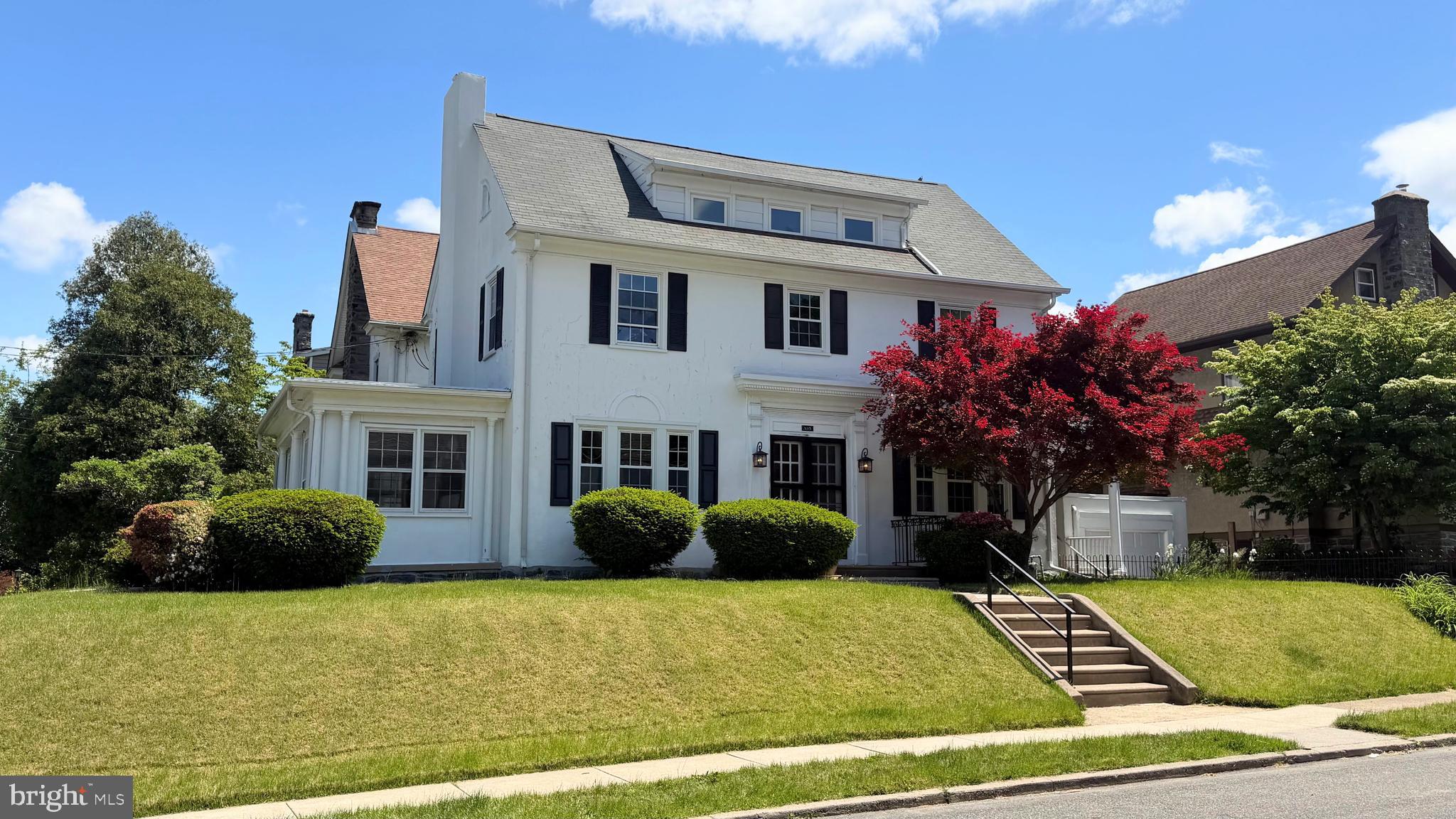 Welcome to this beautifully updated 4BD home where timeless character meets modern comfort. This classic residence makes a striking first impression with its crisp white exterior, manicured landscaping, and charming architectural details. Inside, you’ll find bright, inviting spaces filled with natural light, refinished hardwood floors, elegant archways, and tasteful updates throughout. The spacious living area features a stunning fireplace and flows seamlessly into the dining and gathering spaces, creating an ideal layout for both everyday living and entertaining. Thoughtful built-ins, updated finishes, and neutral tones create a move-in-ready feel while maintaining warmth and character. The elevated corner lot provides excellent curb appeal and a welcoming presence, with mature trees and well-kept grounds completing the setting. Conveniently located near parks, shopping, dining, and local amenities, this home combines classic style, modern updates, and everyday functionality in one exceptional package.