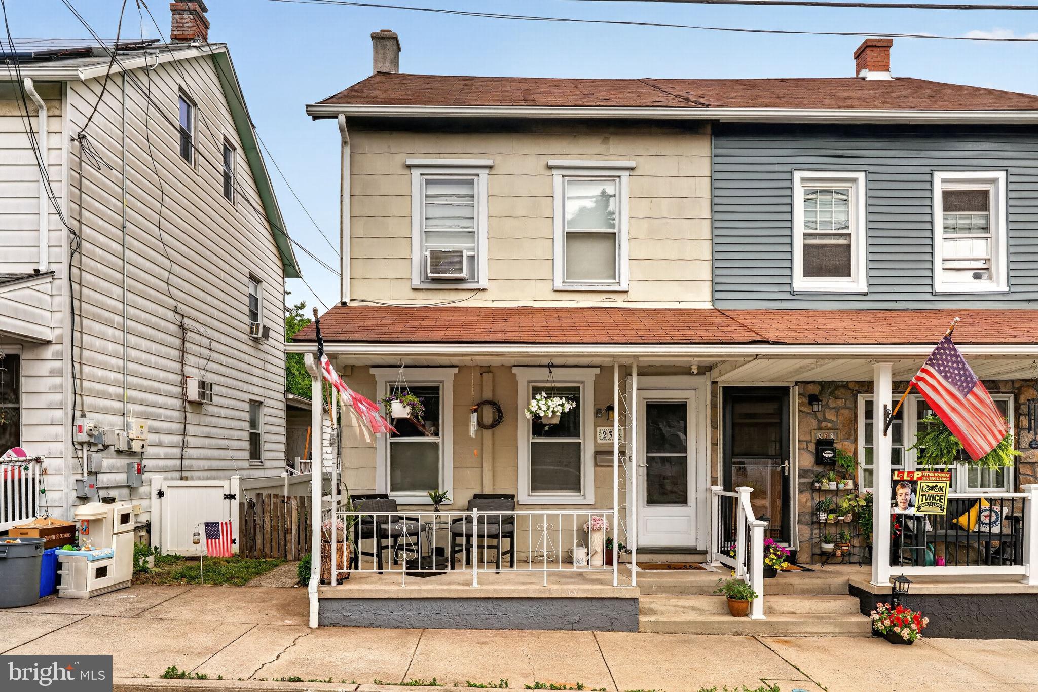 Discover the charm of 233 Adrain St in Emmaus Borough.  This home immediately welcomes you with a charming covered front porch perfect for enjoying neighborhood views. Inside, the inviting living area boasts rich hardwood floors and ample natural light, flowing seamlessly into a well-lit dining space, also adorned with gleaming hardwood and a stylish ceiling fan. The functional kitchen is equipped with a, electric range, microwave, refrigerator and classic white cabinetry. An organized pantry provides abundant shelving and cabinet space, ensuring all your culinary essentials are neatly stored.

Comfort extends to the bedrooms, where some offer plush carpeting and others showcase the warmth of hardwood floors, each featuring a cooling ceiling fan for optimal comfort. The bathroom presents wood-style flooring and a wood vanity, adding to the home's cohesive design. Ascend to the versatile attic space, which features vaulted ceilings and carpeting, ideal for a home office or creative studio. The utilitarian basement area houses laundry facilities, including a washer and dryer, and essential utility equipment. Step outside to a private, fenced backyard featuring a covered patio, perfect for outdoor relaxation and entertaining. A well-maintained yard, complete with a shed, offers ample space for outdoor activities, making this property an exceptional find in Emmaus Borough.