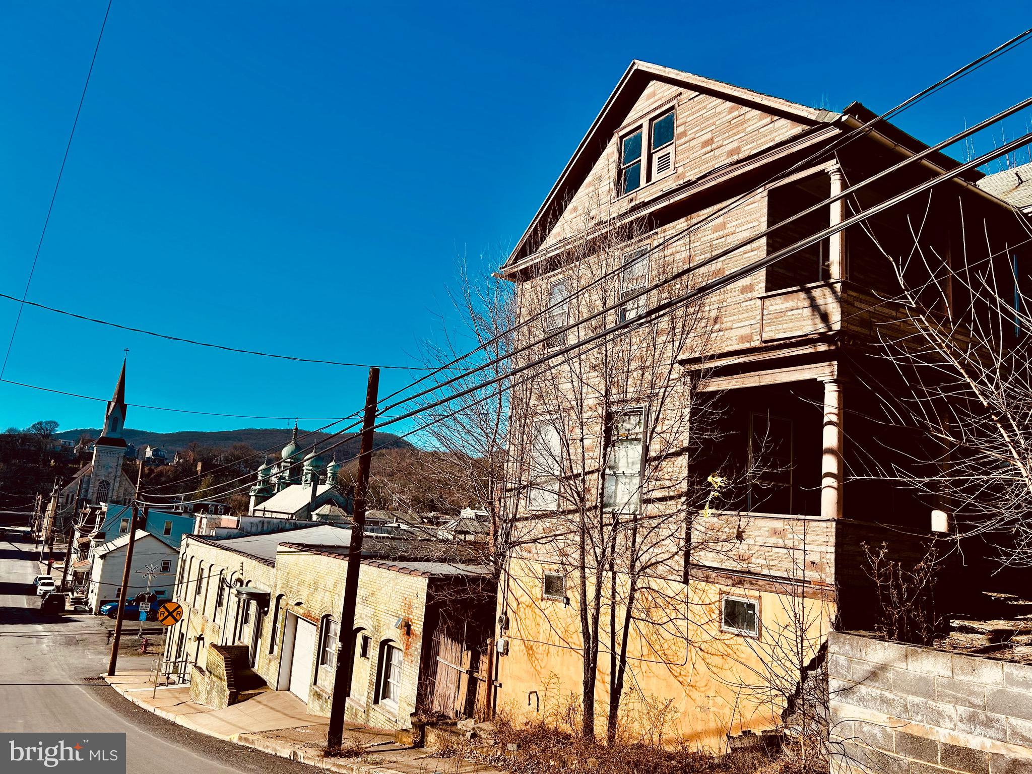 $15,000! Very large home on the hill in Shamokin for sale. Could be a great income producing property! Building appears that it may have been 3 units at one time. Cash only. No owner financing. Sold As-IS.