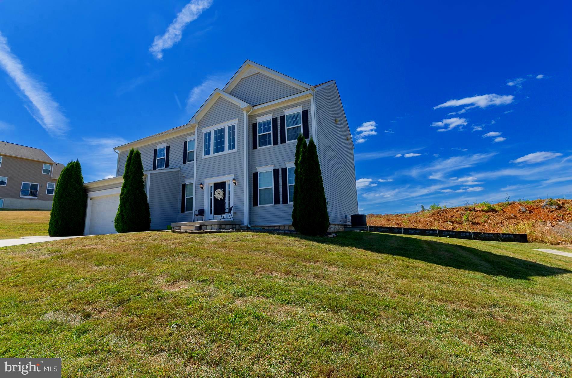 This beautiful two-story colonial is the perfect blend of elegance, comfort, and thoughtful design—an exceptional home that truly has it all.

Inside, you’ll find four spacious bedrooms and three-and-a-half baths, complemented by nine-foot ceilings, recessed lighting, rich finishes, granite countertops, and stainless steel appliances that give the home a polished, modern feel. The open layout is anchored by a grand two-story foyer, complete with a striking overlook that adds both drama and architectural charm.

The second floor features four bedrooms, including a massive owner’s suite with a luxurious primary bathroom designed for relaxation. A second-floor laundry room adds everyday convenience and makes daily living effortless.

The fully finished basement expands the living space even further, offering an office, recreation room, and an additional bedroom—ideal for guests, hobbies, or working from home.

While the interior is impressive, the true showstopper is the custom-built covered patio and outdoor recreation area, accessed directly from the kitchen. This beautifully designed exterior space includes a TV mount and plenty of room to relax or entertain, creating a seamless indoor-outdoor lifestyle that’s hard to beat.

An attached, beautifully finished two-car garage and a desirable corner lot complete the picture, making this home not just functional, but truly special.

Elegant, spacious, and designed for both everyday living and memorable entertaining, this home stands out as an exceptional piece of real estate.