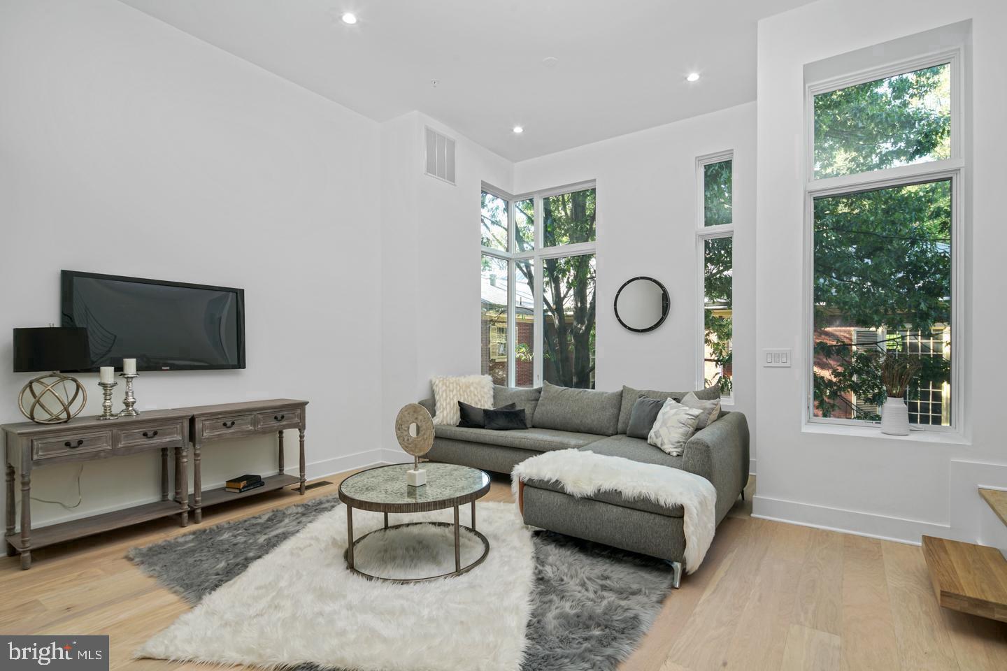 Live in opulence in the fully loaded home at Lippincott Alley. Lippincott is a premier living destination in the heart of Old City. Located next to the historic Arch Street Meeting House, the townhomes at Lippincott provide a sanctuary from the bustling pace of life in the city. Enter your front door from a quiet, brick-paved lane and step into a home that is refreshingly contemporary or enter from your 2-car GARAGE! Enjoy an open concept main level floor plan that is perfect for entertaining. Relax and unwind in the comfort of the living room. This light-filled space highlights the natural beauty of the surrounding landscape. Cooking won't feel like a chore in this gorgeous kitchen equipped with Wolf and Sub-Zero appliances, granite countertops, plenty of cabinets for storage and direct access to your private balcony. The second floor features two large bedrooms with custom walk-in closets. Each bedroom has its own bath - one with a tub/shower combo, the other with a glass-enclosed shower. A bonus feature of the space includes upper-level laundry with Whirlpool front loading washer and dryer. Pamper yourself in the master suite. Enjoy a generous walk-in closet with custom storage system and spa-like master bath featuring a double vanity, free-standing soaking tub, large glass-enclosed shower with multiple shower heads and rain shower plus tons of natural light. A private elevator whisks you up to the roof deck where you can enjoy the view and watch the fireworks at Penn's Landing. The pilot house is equipped with a wet bar, beverage center, open shelving and lounge area - plus a powder bath. Leave the car parked in your private two car garage. Enjoy the ease of being walking distance to the best of Old City - located just minutes from public transit, the city's best restaurants, boutique shops, art galleries and area attractions. Additional features of this 3-4 bedroom, 4 full and 2 powder bath home include include a finished basement, a full bath, flex space for a 4th bedroom and extra storage, gorgeous hardwood floors and tile throughout, high ceilings, and alarm system. Luxury living in one of the most historic locations in the US. What more could you ask for? Schedule a showing today. All square footage numbers are approximate and include above and below grade measurements. Private water $24/month. Tax abatement started in  2019.