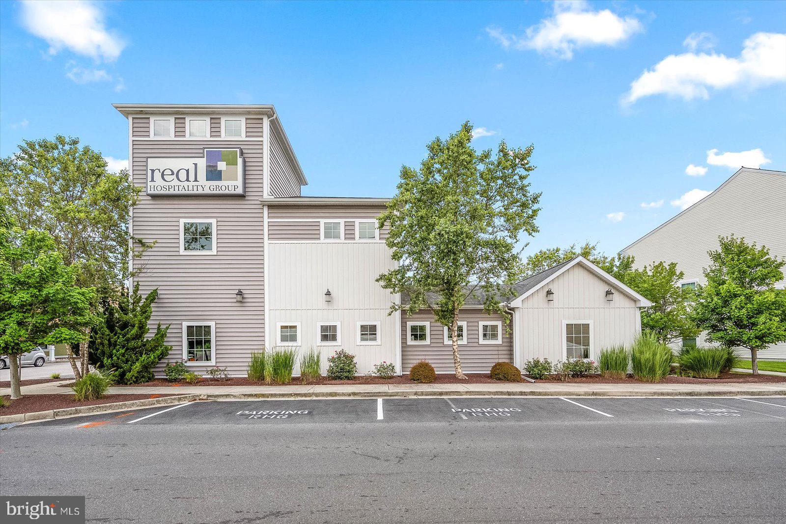 This is a fantastic opportunity to establish your company’s presence in West Ocean City by owning a stunning two-story custom commercial building. Zoned C-1, the property offers a range of possibilities for various business types. Currently used as an office, the building radiates professionalism and sophistication. Upon entering, you are welcomed by a grand two-story reception area, setting a positive tone for clients and visitors. The space includes numerous private offices, a large bullpen, a conference room, and a boardroom. Additional features include a fully equipped kitchen and a beautiful outdoor courtyard, enhancing the workplace atmosphere. The property offers easy access for clients and employees, with ample parking available. Don’t miss the chance to own a piece of Ocean City and create the ideal home for your business.