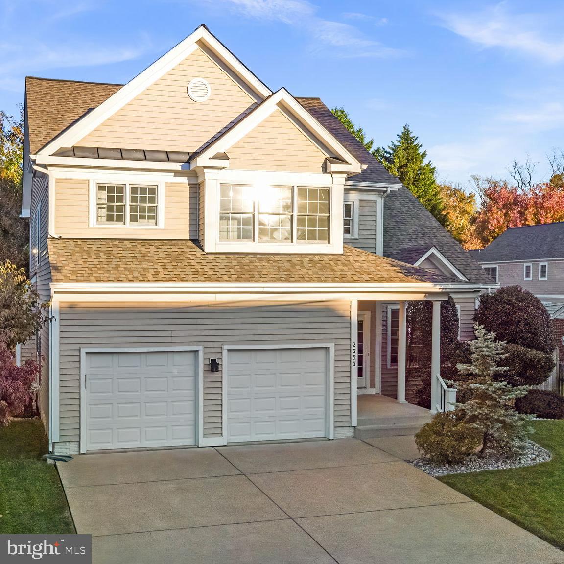 Photos coming 10/24! Lovely move-in ready home in the McLean High School pyramid, perfectly situated in Falls Church/Fairfax County!  Built in 2001, this well-maintained property offers the comfort of newer construction in an established neighborhood, within walking distance of Founders Row, restaurants, and local shops. Enjoy easy access to the W&OD Trail for biking and jogging, and a quick commute with Route 66 and the West Falls Church Metro just over a mile away. A welcoming covered porch leads into a bright two-story foyer and beautiful hardwood floors that continue throughout the main level. The formal living and dining rooms feature detailed moldings and windows on three sides that fill the home with natural light. The spacious kitchen includes 42” wood cabinetry, a prep island, pantry, and generous counter space, and a breakfast area with French doors to the backyard. The inviting family room is open to the kitchen and centers around a cozy gas fireplace and has direct access to the attached two-car garage. Upstairs, the primary suite has cathedral ceilings, two walk-in closets, and an ensuite bath featuring double vanities, a soaking tub, and a separate shower. Three additional well-sized bedrooms, a hall bath, and a convenient second-floor laundry room complete this level. The fully finished lower level adds valuable living space with a large recreation room, a fifth bedroom with an egress window, a full bath with a bidet, ample storage, and a walk-up to the fenced backyard. Outdoor living is easy with a brick paver walkway and patio, plus a raised deck that’s great for barbeques and evenings under the stars. With its open and flexible floor plan, prime Falls Church location, and sought-after schools, this home offers both everyday comfort and exceptional convenience, welcome home!