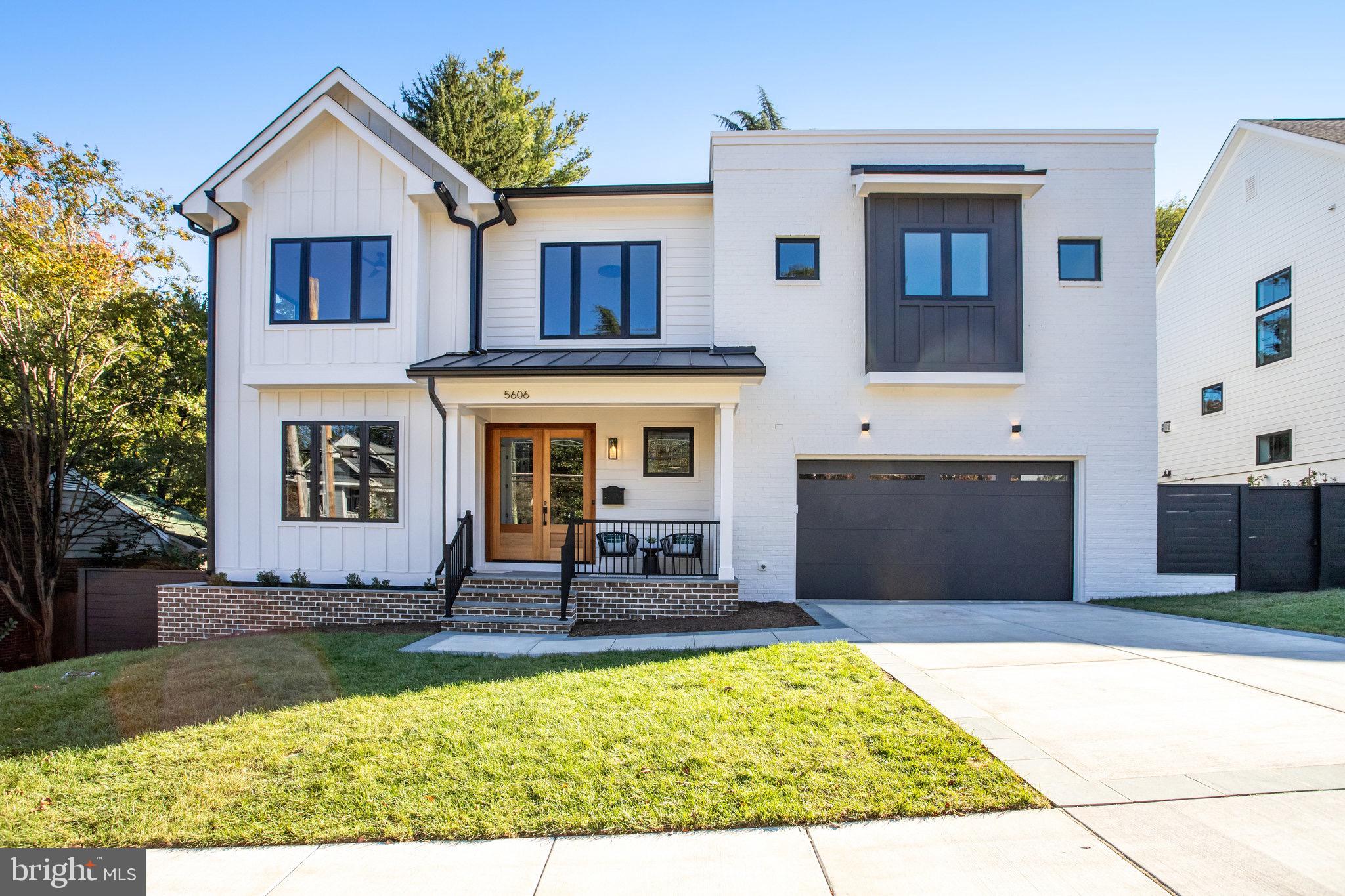 Introducing the stunning new MOVE-IN ready home at 5606 Williamsburg Blvd in Arlington’s coveted Crescent Hills neighborhood. This 5-bedroom, 6-bath residence showcases contemporary sophistication, blending cutting-edge features with impeccable attention to detail. The open-concept main level, with 10' ceilings, is designed for both entertaining and everyday living. A spacious office, which can also serve as a guest room, adds versatility to the layout. The formal dining room flows seamlessly into the expansive living room, complete with a cozy gas fireplace and access to the covered porch—perfect for indoor-outdoor living (The builder is planning to install heaters on the screened porch). The gourmet kitchen is anyone’s dream, featuring custom cabinetry, quartz countertops, and high-end Thermador appliances, including a 48" Dual Fuel Grand Pro Range, a built-in column panel-ready 30" refrigerator, 18" freezer, panel-ready dishwasher, microwave drawer, and a second dishwasher in the pantry. The walk-in pantry, equipped with a secondary sink, adds extra convenience. The kitchen island offers bar seating for informal dining. Completing the main level is a full bath and a functional mudroom with built-in bench seating, providing easy access to the 2-car garage. European Oak Select Grade Mercury hardwood flooring on the main and upper levels adds warmth and luxury. Upstairs, with 9' ceilings, you’ll find four spacious bedrooms, including the luxurious primary suite. This retreat features a sitting room, two large walk-in closets with custom built-ins, and a spa-like bathroom with heated floors, a soaking tub, a walk-in shower, and dual vanities. The second bedroom includes a private ensuite bath, while the third and fourth bedrooms have ensuite bathrooms and walk-in closets. A Samsung high-efficiency front-load washer and electric dryer complete the upper level’s amenities. The fully finished lower level, also with 9' ceilings, offers a fitness room, recreation/family room with a wet bar, and a fifth bedroom with a walk-in closet and attached full bath—ideal for a guest or au pair suite. The lower level is enhanced by durable Lifeproof Dusk Cherry LVP flooring, abundant storage, and an optional second laundry hook-up for added convenience.  Built with energy efficiency in mind, this home features advanced systems that combine style, functionality, and sustainability—all in a prime Arlington location.