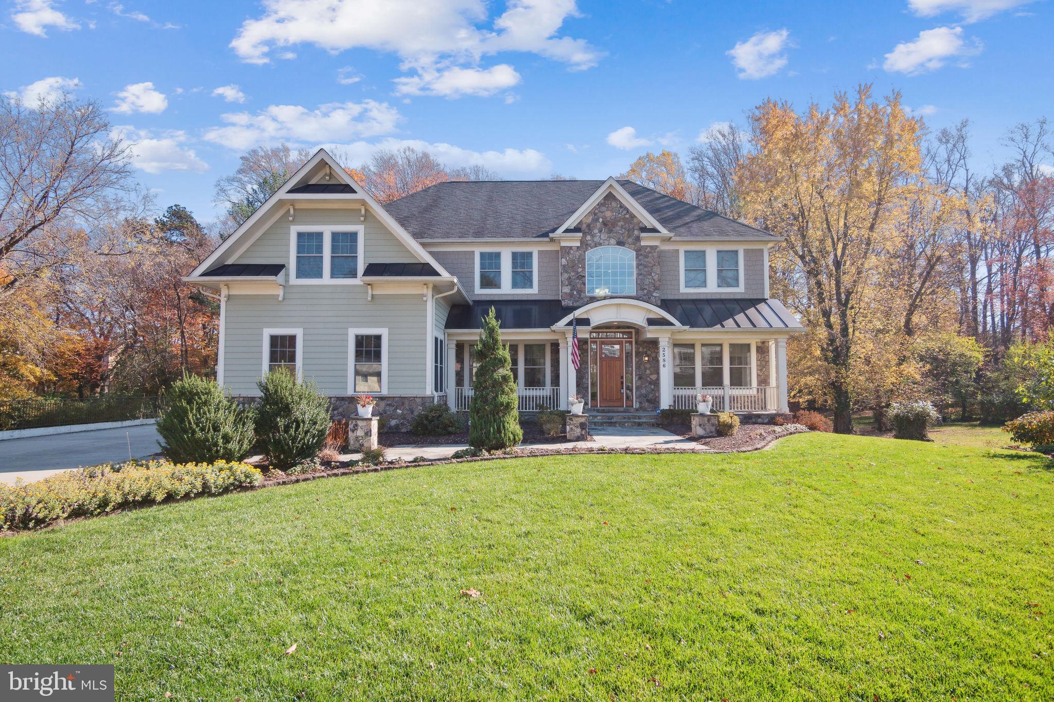 Move in ready, 10 year young home with lots of upgrades on a 1/2 acre lot in Vienna!  This 7+ bedroom/6.5 bath home features a gourmet kitchen with a walk-in pantry, loads of cabinets, upgraded appliances, wine storage and beverage fridge with an adjacent morning room and family room with fireplace. A great entertainment space for the holidays or any day. You can also enjoy your meals in  the lovely 3 season room or out on your deck (Trex decking) overlooking a beautifully manicured yard with stone patio, lighted gazebo, water feature and storage shed. The main level also features an en suite bedroom with large walk in closet, a formal dining room and a spacious office/library with French doors  for privacy. Up the stairs off the 2-story foyer, you will find the lovely owner's suite with his/hers walk in closets and bath with double sinks, soaking tub and spacious shower with many features and a beverage center just outside in the hallway for all to enjoy.   The remaining 4 bedrooms are bright and roomy.  The lower, walkout level of this home features an additional 1892sf which includes a game room. recreation room, media room, the 7th large, en suite bedroom with walk in closet. Additionally, there is an exercise room that could possibly be an 8th bedroom. A mud room with cubbies sits just inside off the 3-car garage. The concrete driveway provides ample overflow parking. Ring security system conveys. Very close proximity to Madison High School. A must see, this home has it all!