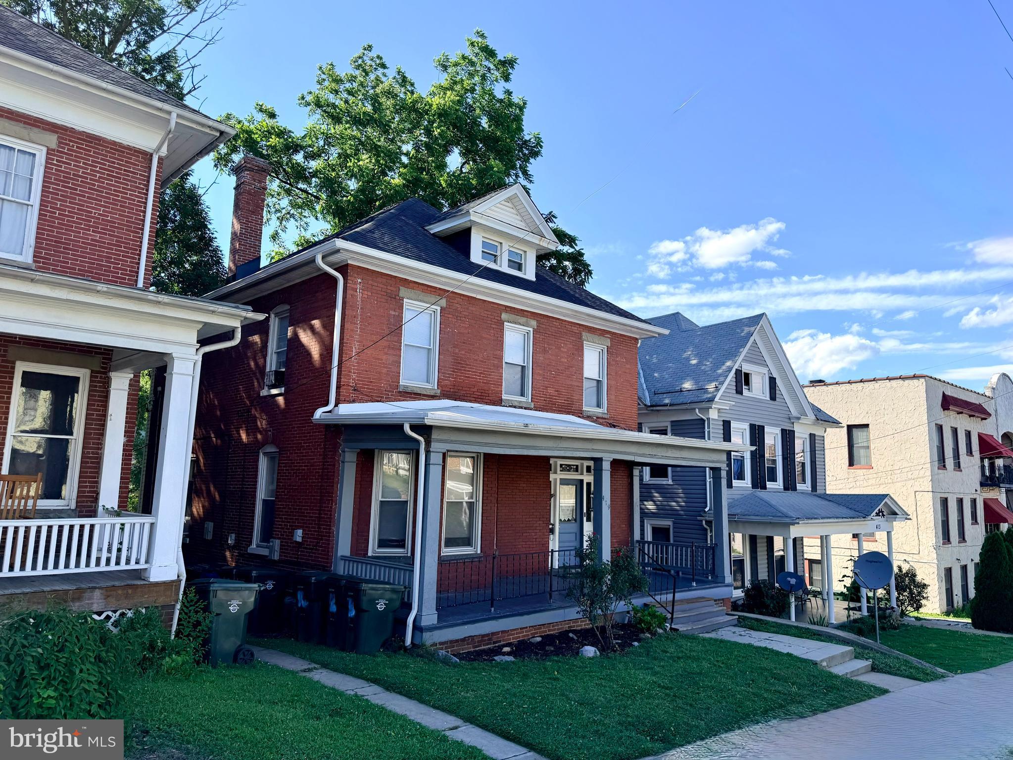 New roof going on both front and rear buildings, along with new gutters and downspouts.   The owner will consider holding owner financing. Owner is also selling  311 Summit Ave with 6 units, will do package deal. Great positive cashflow investment opportunity! Well maintained 3 unit apartment building in the front and a 2 unit over under apartment in the rear with alley access.  Not far from beautiful City Park, Meritus Park, University of Maryland Hagerstown Campus, Barbara Ingram School of the Arts, Maryland Theatre, restaurants and more! This building is fully occupied and produces approximately $4,700 a month in income! Natural gas forced air heat! Separate electric meters. Large backyard.  Rent roll available upon request,  Schedule a tour today!!