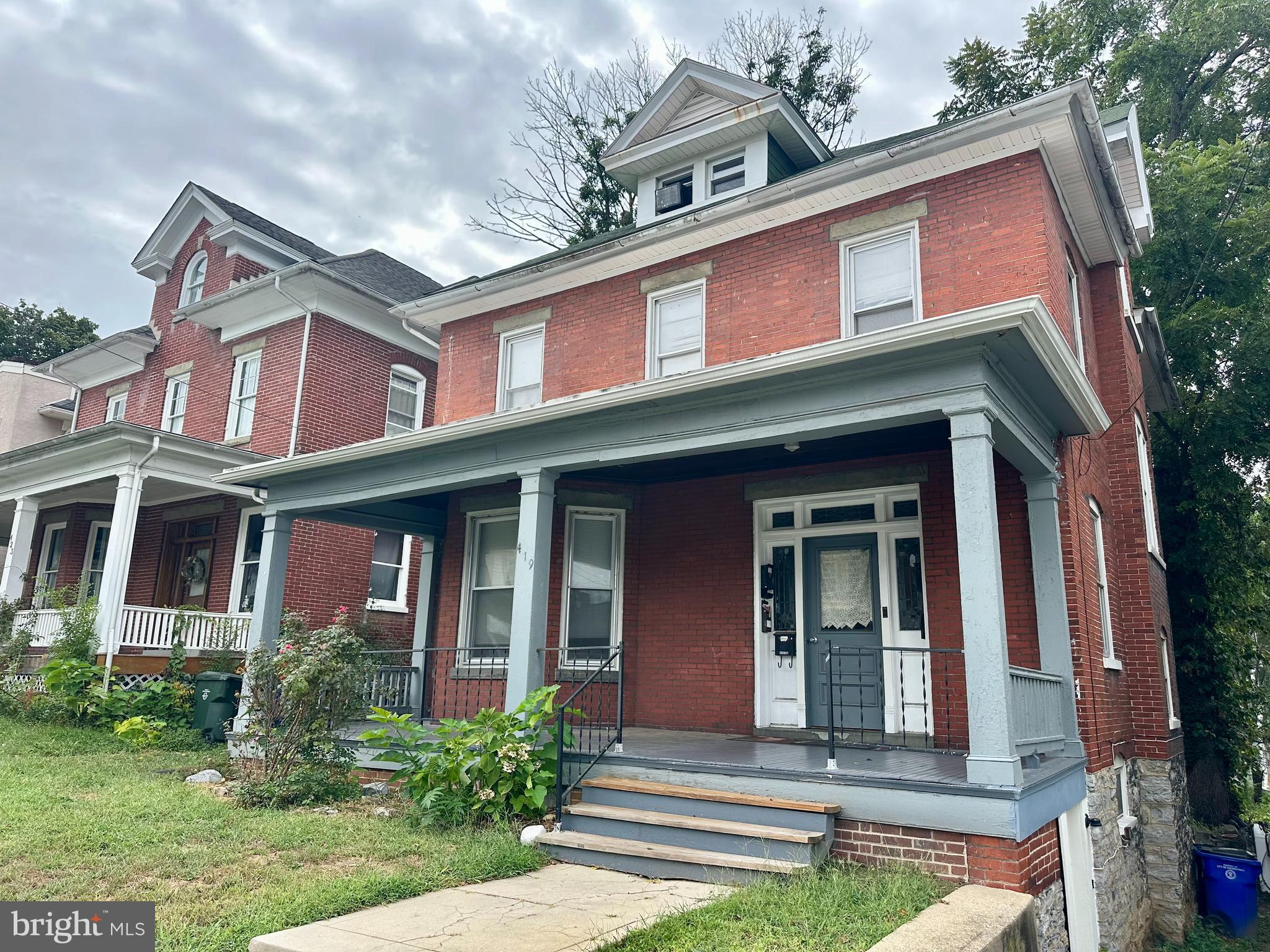 New roof going on both front and rear buildings, along with new gutters and downspouts.   The owner will consider holding owner financing. Owner is also selling  311 Summit Ave with 6 units, will do package deal. Great positive cashflow investment opportunity! Well maintained 3 unit apartment building in the front and a 2 unit over under apartment in the rear with alley access.  Not far from beautiful City Park, Meritus Park, University of Maryland Hagerstown Campus, Barbara Ingram School of the Arts, Maryland Theatre, restaurants and more! This building is fully occupied and produces approximately $4,700 a month in income! Natural gas forced air heat! Separate electric meters. Large backyard.  Rent roll available upon request,  Schedule a tour today!!