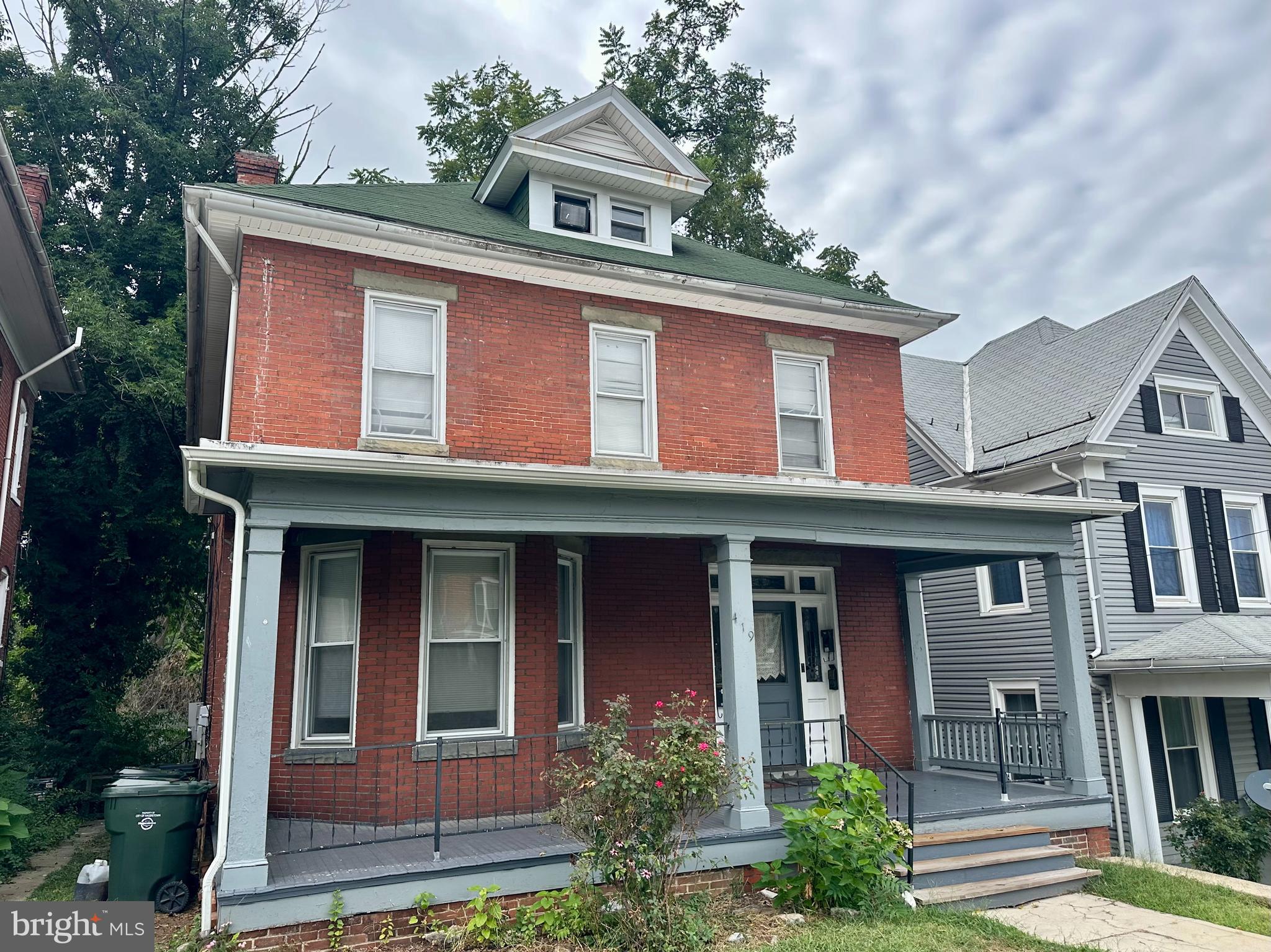 Great positive cashflow investment opportunity! Well maintained 5 unit apartment building not far from beautiful City Park, Meritus Park, University of Maryland Hagerstown Campus, Barbara Ingram School of the Arts, Maryland Theatre, restaurants and more! This building is fully occupied and produces approximately $4,700 a month in income! Natural gas forced air heat!  This property includes 2 buildings: front building has 3 units and the rear building has 2 units. Large backyard,. The owner will consider holding owner financing. Owner is also selling  311 Summit Ave with 6 units.