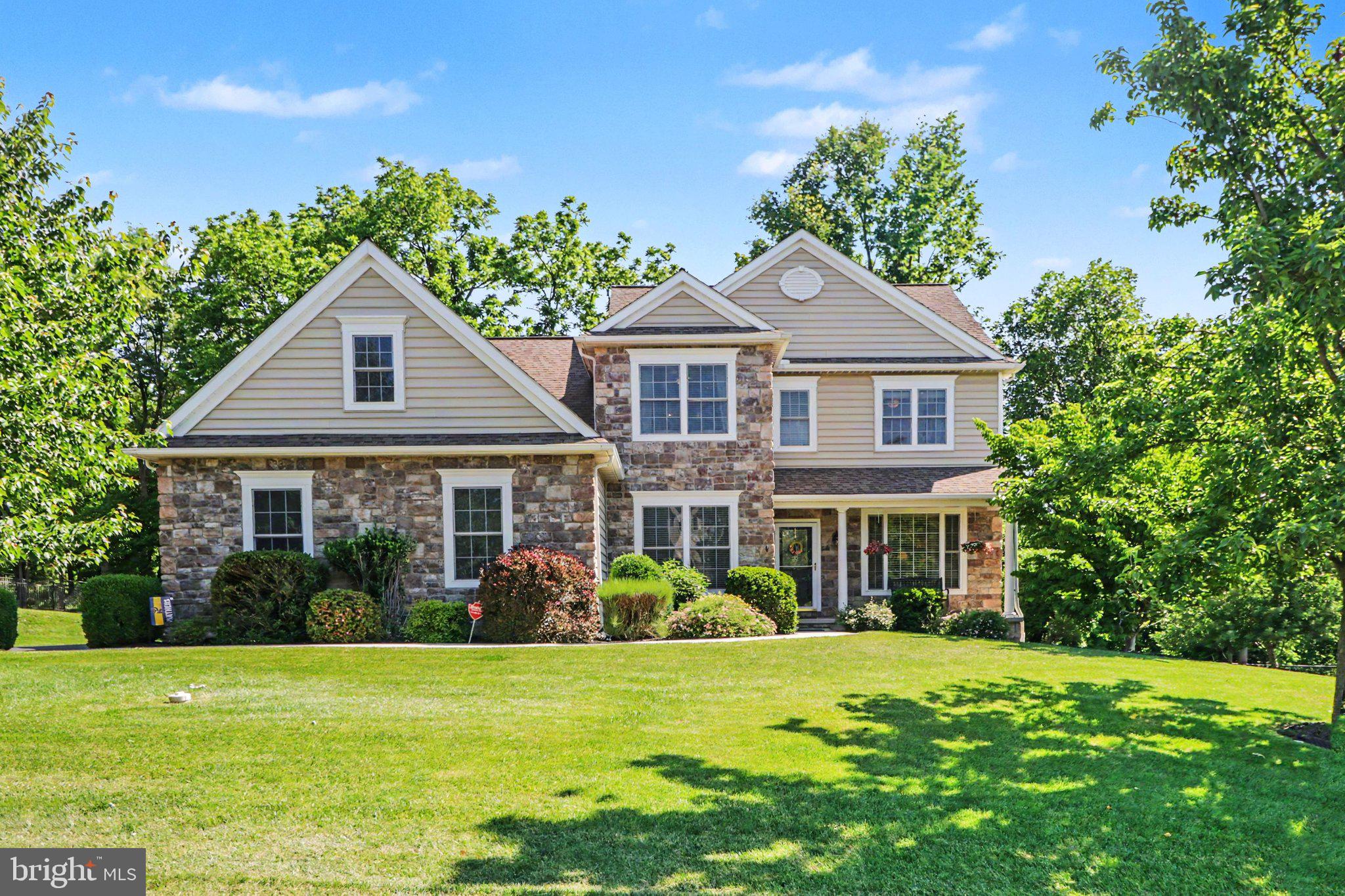 Nestled in the serene community of Millfording Highlands, this charming traditional home offers a perfect blend of comfort and elegance within Cumberland Valley School District. Built in 2007 by EG Stoltzfus, this beautifully maintained residence boasts plenty of space and thoughtfully designed living space, ideal for both relaxation and entertaining. Step inside to discover a warm and inviting atmosphere, highlighted by a cozy fireplace, built in bookcases and a kitchen with granite counters and stainless-steel appliances that serve as the heart of the home. With five spacious bedrooms and four and a half bathrooms, there’s ample room for everyone to unwind. The finished walkout basement provides additional living space featuring a full bathroom and dedicated beverage station with sink and cabinetry. Perfect for entertaining, hosting guests, creating a media room, game room, or flexible recreation space. Enjoy the convenience of an attached three-car garage with side entry, ensuring easy access and plenty of storage for all your needs. Set on a generous 0.41-acre lot, the outdoor space offers endless possibilities for gardening, play, or simply enjoying the fresh air. The professionally landscaped backyard showcases paver hardscaping, custom fire pit, and natural surroundings.  Located in a peaceful neighborhood, this home is just a short drive from local amenities, parks, walking paths, and recreational opportunities. Experience the perfect blend of comfort, style, and functionality in this delightful residence. Don't wait to schedule your showing. Your dream home awaits!