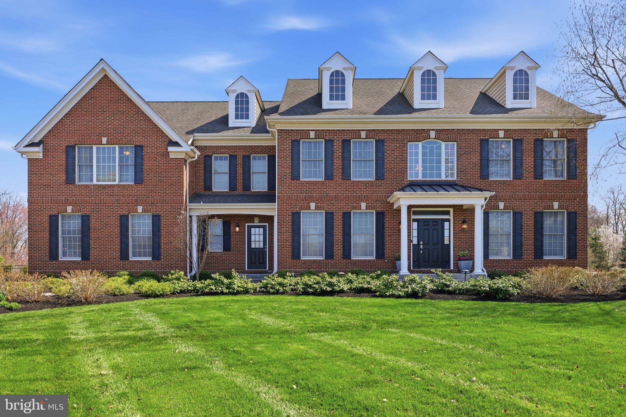 Absolutely gorgeous 5 bedroom, 2 story brick front Colonial on a meticulously landscaped, cul-de-sac lot with fenced yard, 3 car side garage, paver patio and relaxing custom-built outdoor pavilion with heaters and fan! The main entrance features a covered entry porch and leads to a soaring 2 story foyer with an elegant, curving staircase that is central to the home; formal living and dining rooms flank the entry foyer; a 2 story family room with a stone gas fireplace extends behind the open stairway and upper hallway; Granite countertops, stone look ceramic tile flooring, solid wood Century cabinetry, new Blue Star range top, new dishwasher, double ovens and walk in pantry complete the very sizable eat in gourmet kitchen; the kitchen opens to the expanded morning room with cathedral ceiling which is awash with light; a private office, powder room, laundry room/mudroom, convenient rear staircase and a front entrance complete the first level; the second level features a spacious primary suite with sitting room, two walk-in closets flanking a dressing area and an en-suite bath with shower stall and soaking tub as well as dual sinks; also on the second level are four additional large bedrooms and two full hall bathrooms, one of which features dual access—serving both the hallway and providing private, en-suite-style access from one bedroom; the finished basement features a large entertaining area and wet bar along with an expansive exercise room, a convenient half bath, abundant storage and a walk up exterior stairway; Recent upgrades include: Generac whole house generator, in-ground sprinkler and drip irrigation system, whole house water filtration system, new Carrier HVAC systems, new shed (with electric), new washer; other enhancements include custom trim work with shadow box, crown molding and chair rail. Public water and sewer; Natural gas cooking and heat; 2 HVAC systems with 4 zones; Council Rock School District; quick access to Routes I-295, Route 1 and the PA Turnpike as well as Tyler State Park, Core Creek County Park and Historic Newtown Borough; as an added bonus it's only a short walk to Grey Stone Restaurant with indoor and outdoor dining! Compare to nearby new construction and you'll see you can't match this opportunity!